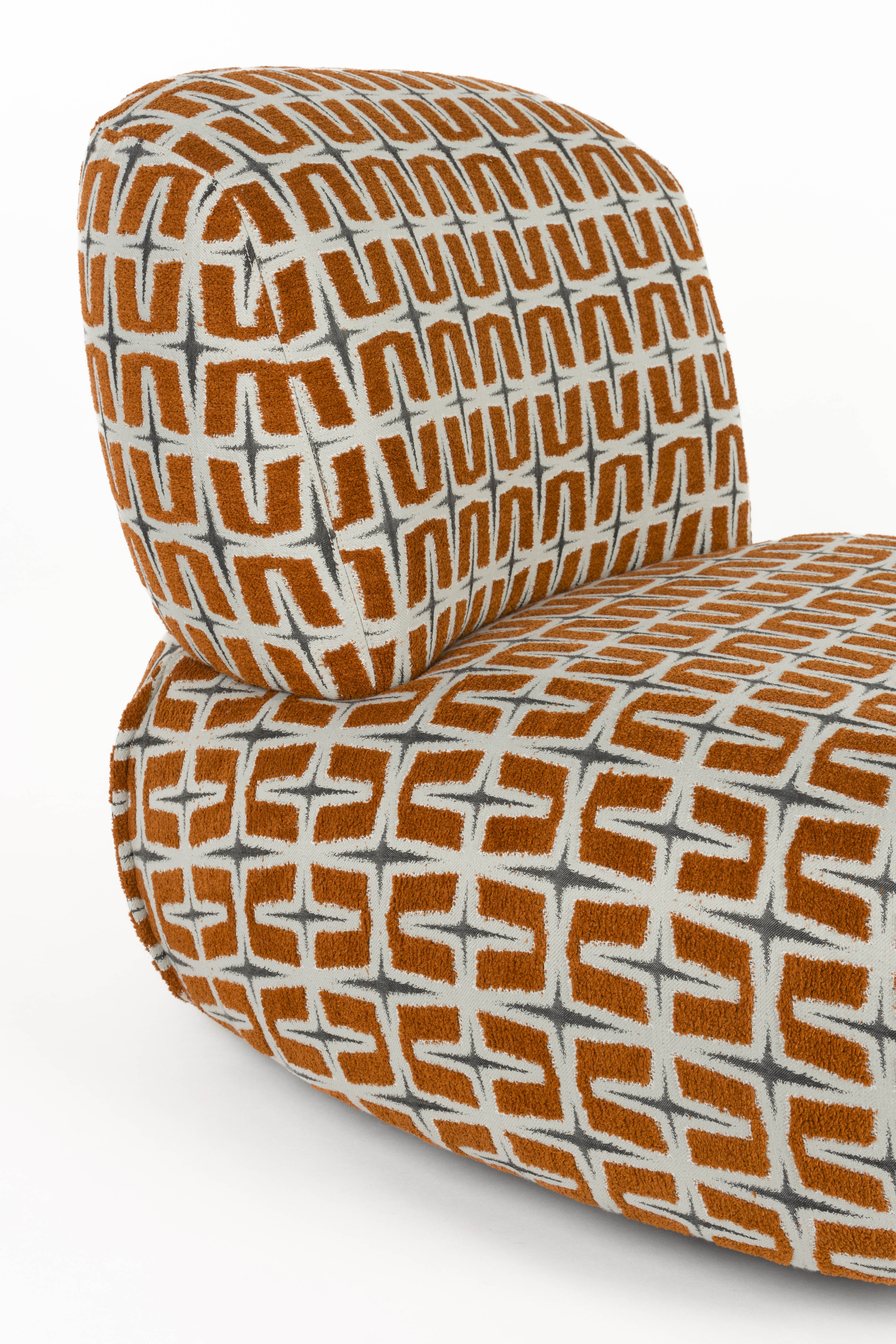 Oranje RITZ fauteuil met geometrisch patroon