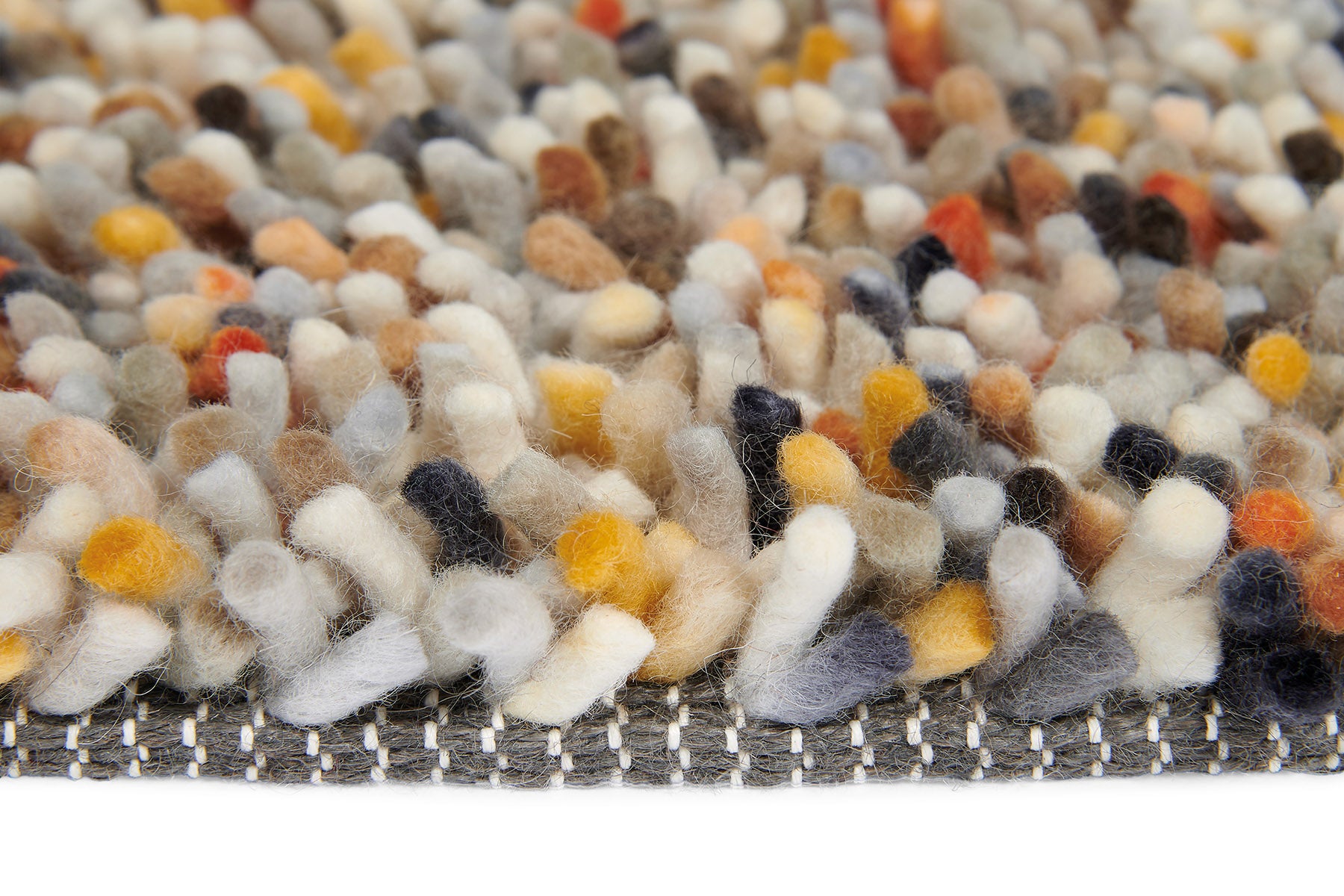 Vloerkleed DOTS oranje-crème met lange haren