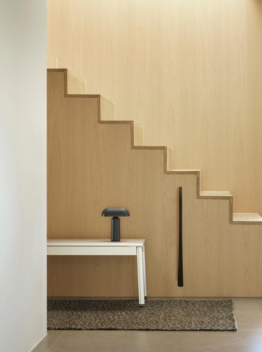 The rug is dark gray