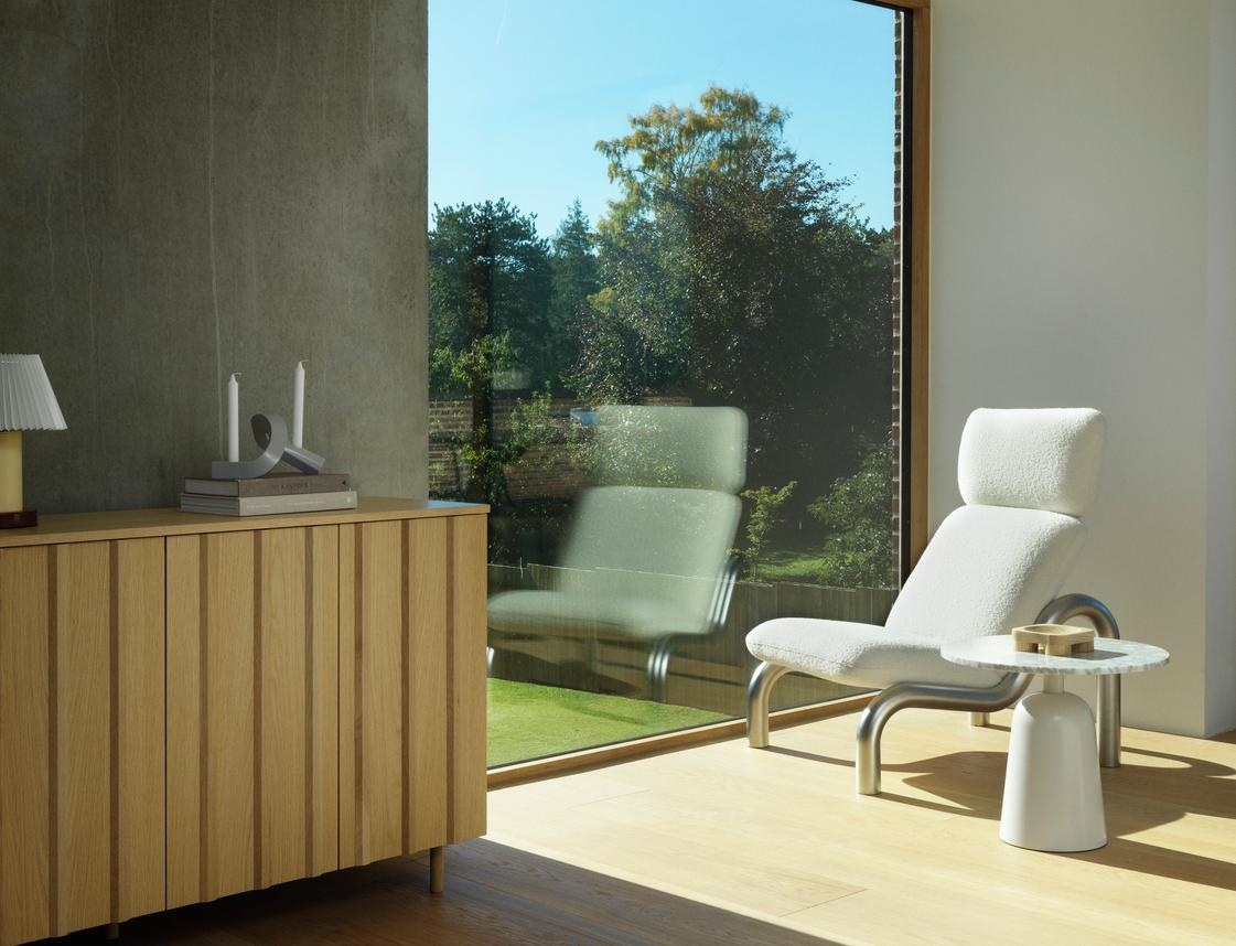 Gestoffeerde fauteuil TUBE met stalen basis