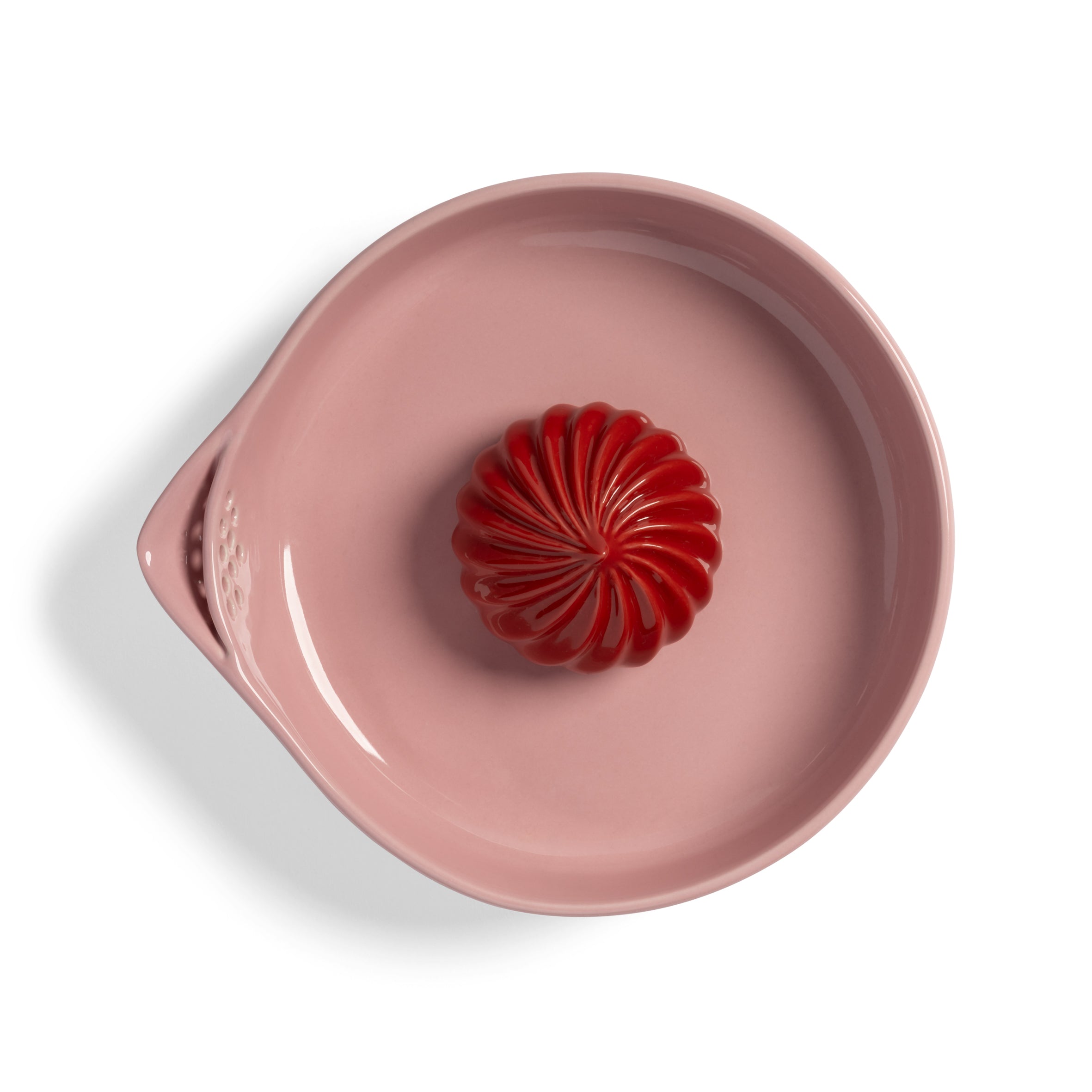 PUDDING pink citrus juicer with red