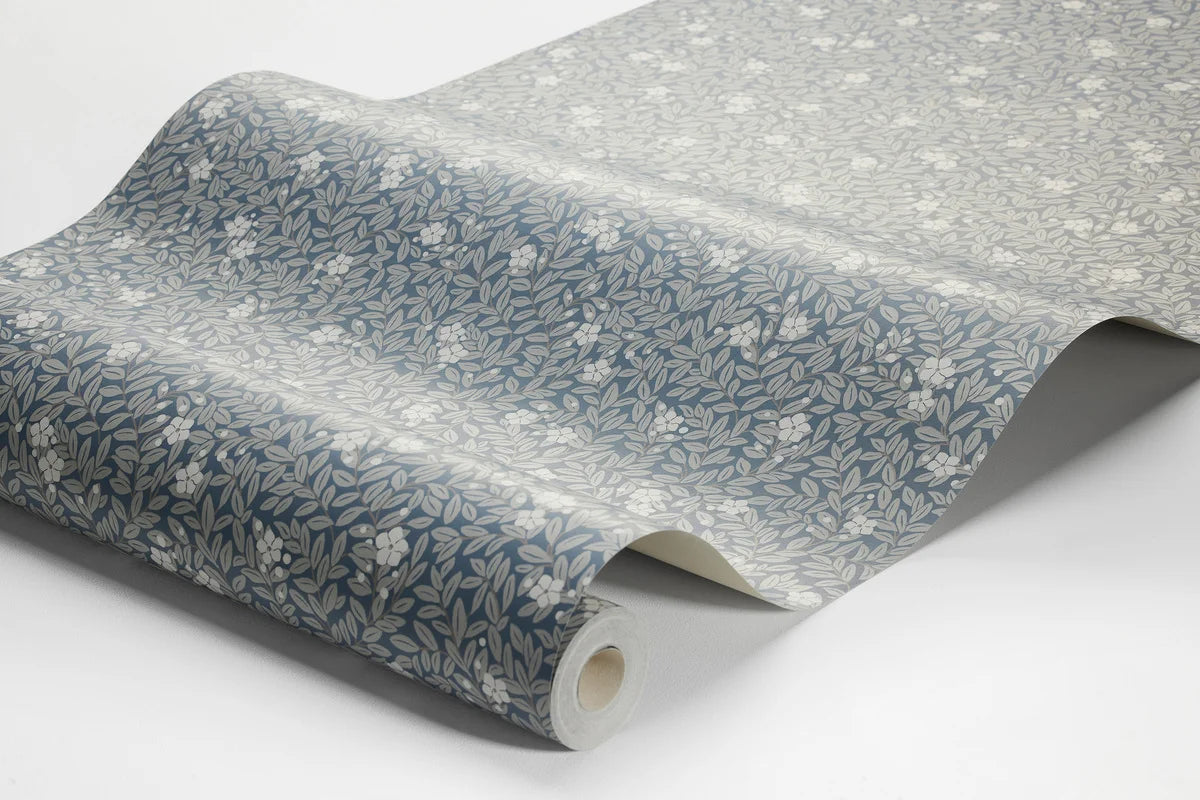Wallpaper with a floral pattern of flowers and leaves MYRTEN blue with white