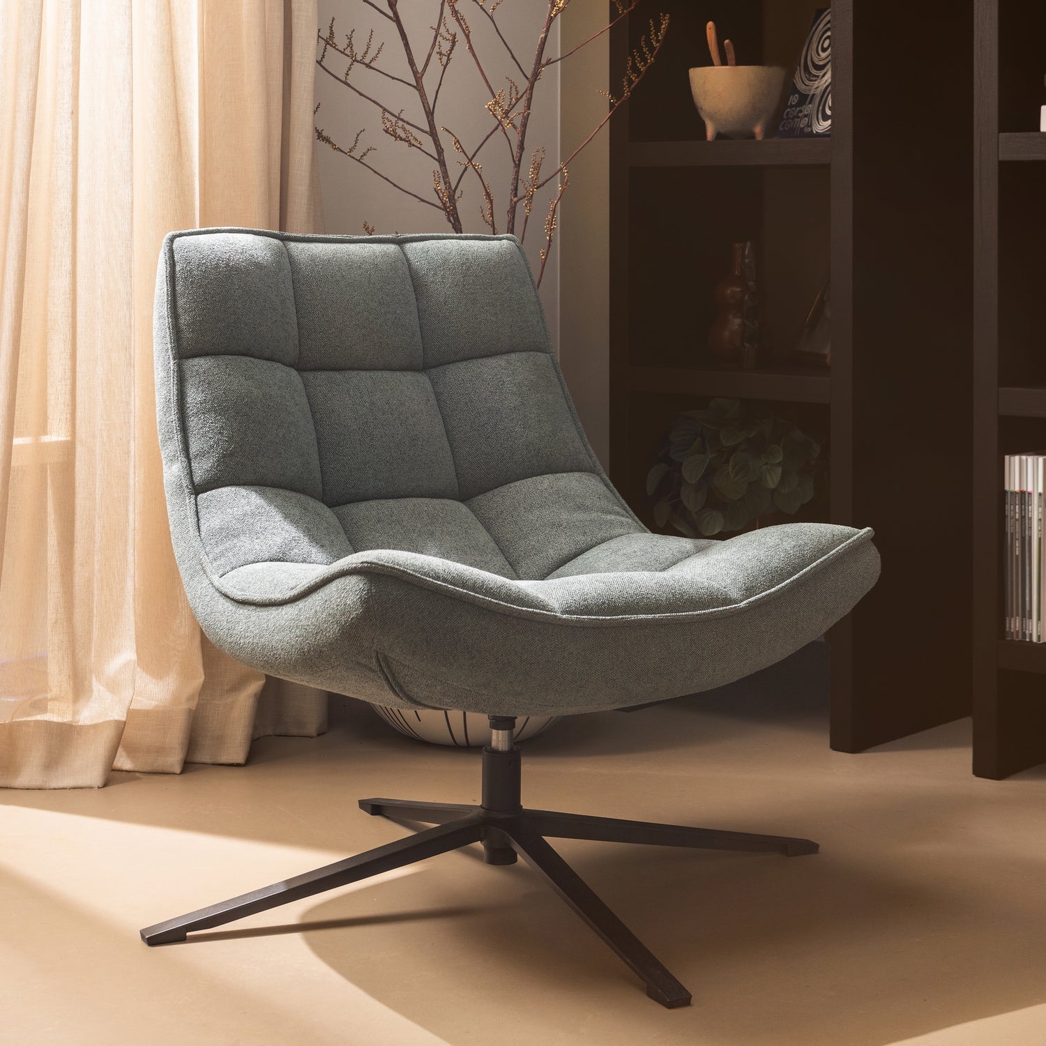 Maudi blue rotary armchair
