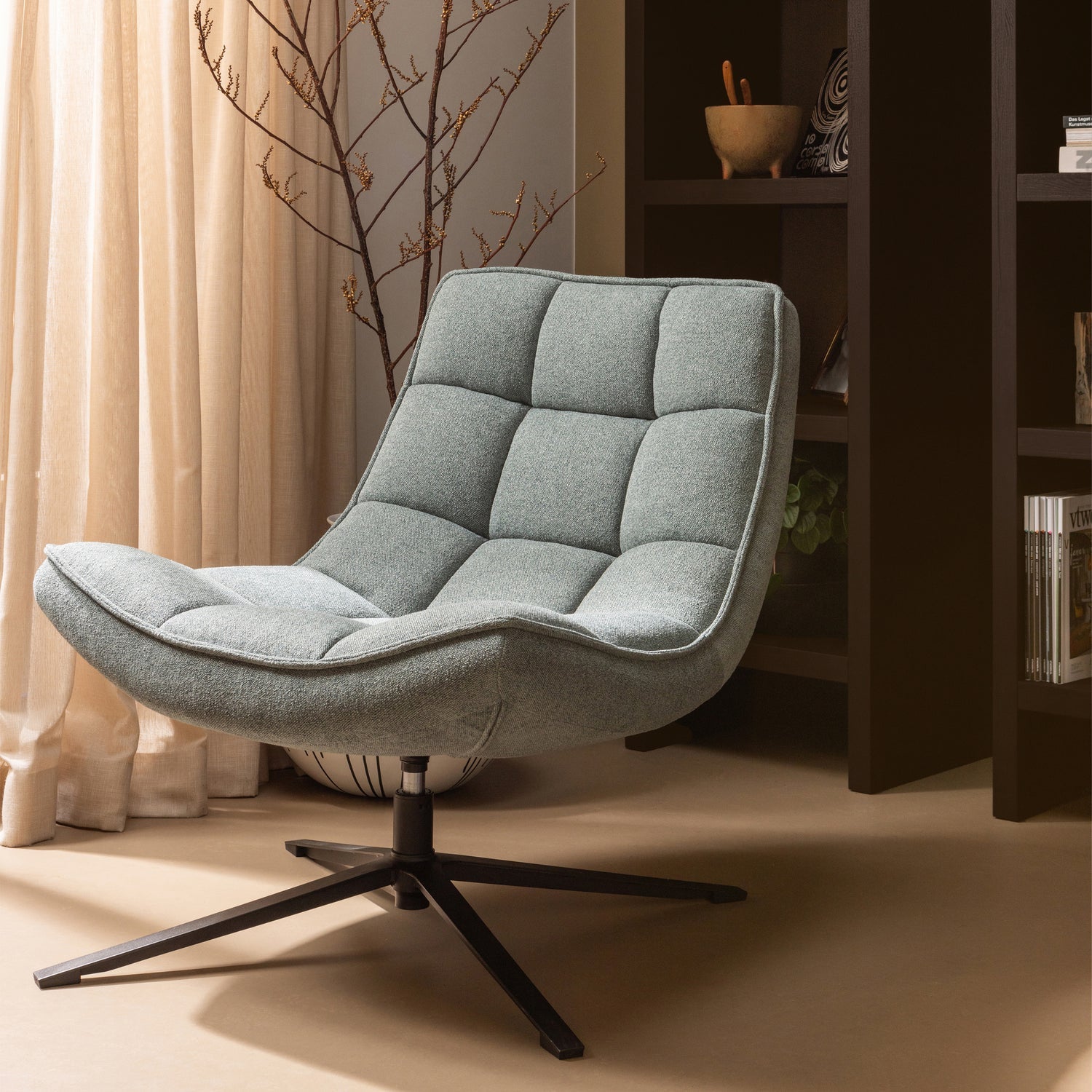 Maudi blue rotary armchair