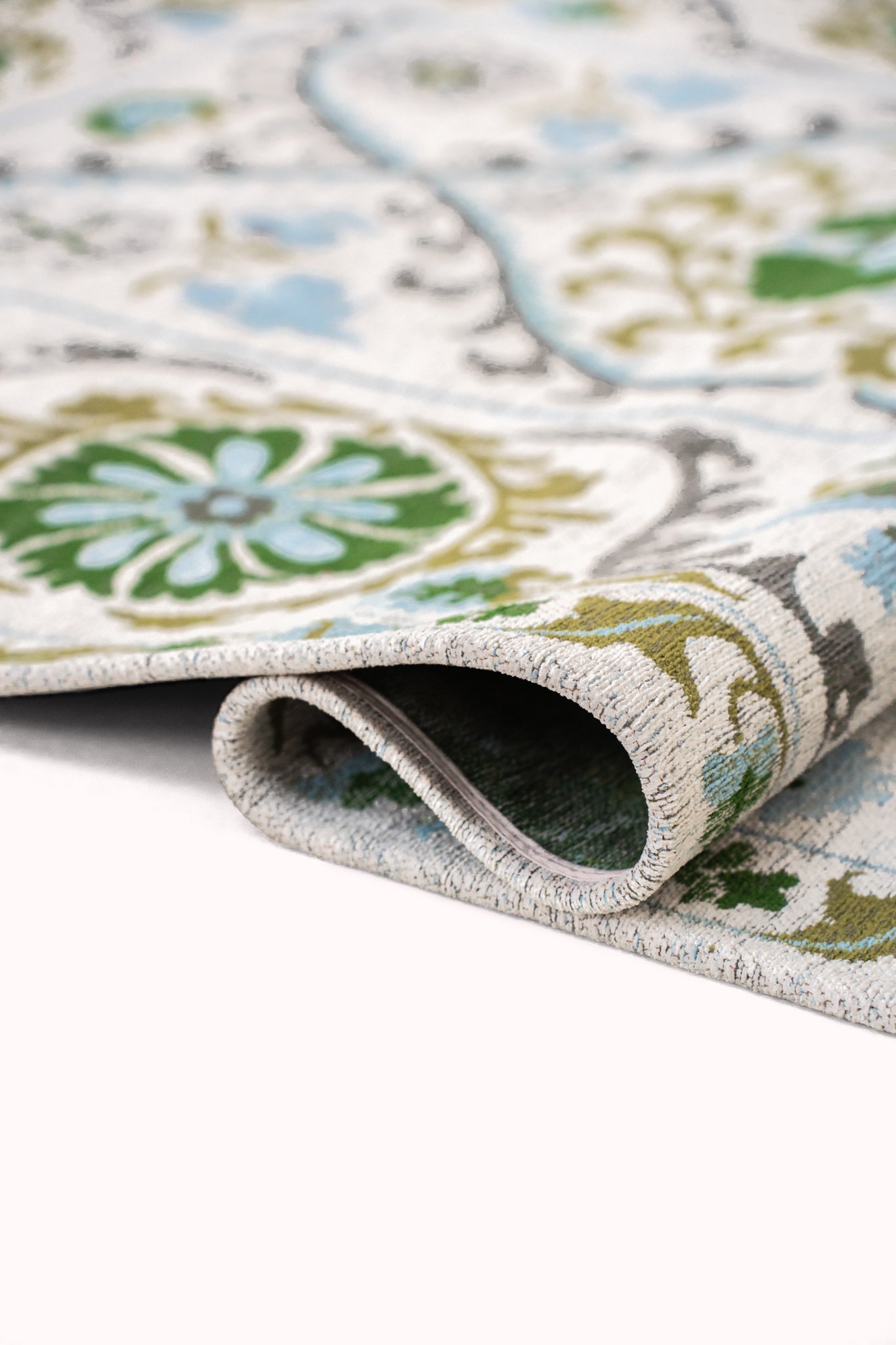 SUZANI SLAVIA rug broken white with green and blue