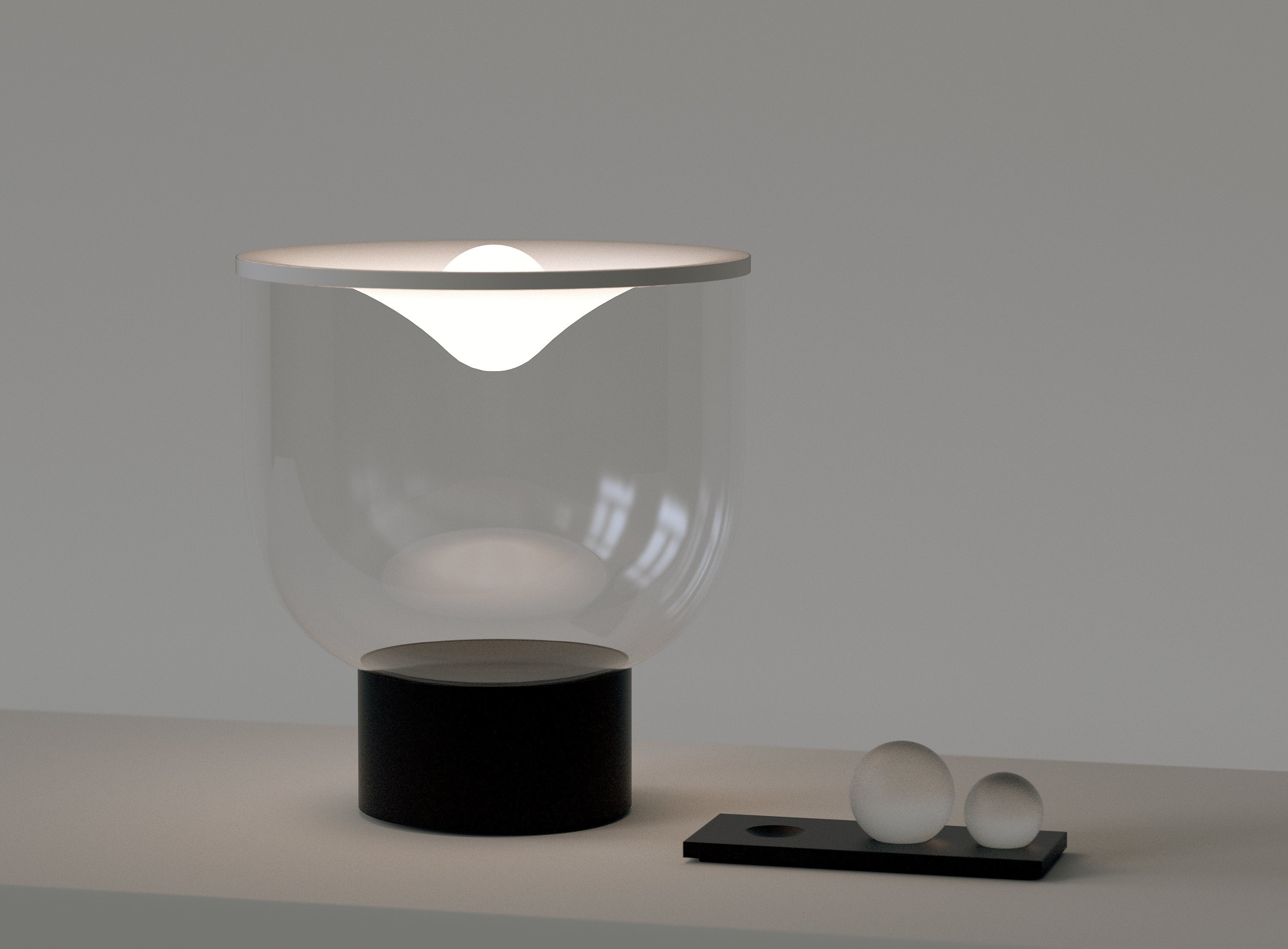 GRAMMOLUCE table lamp with a glass shade and black base.