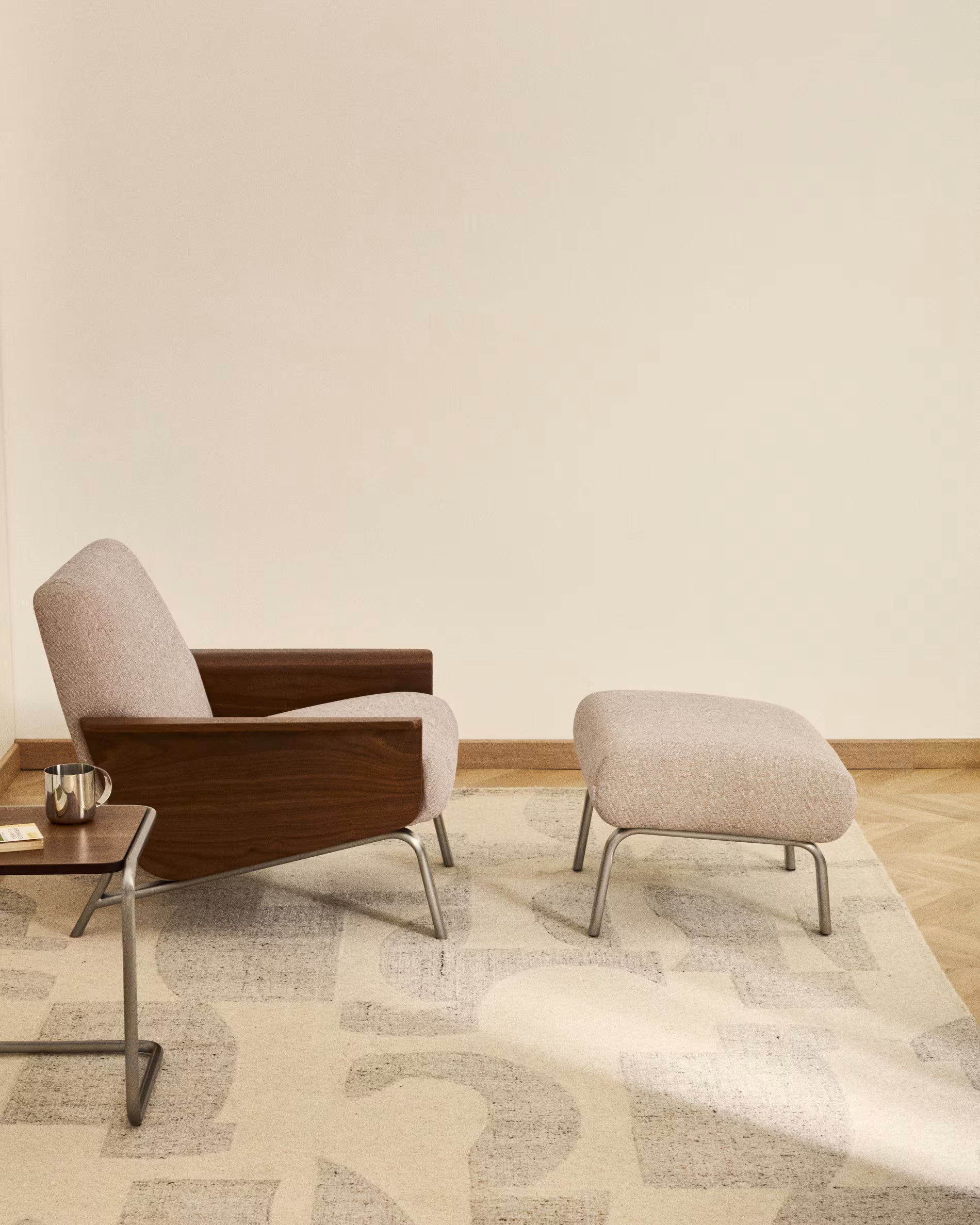 AMSEN footstool in light brown with a steel base