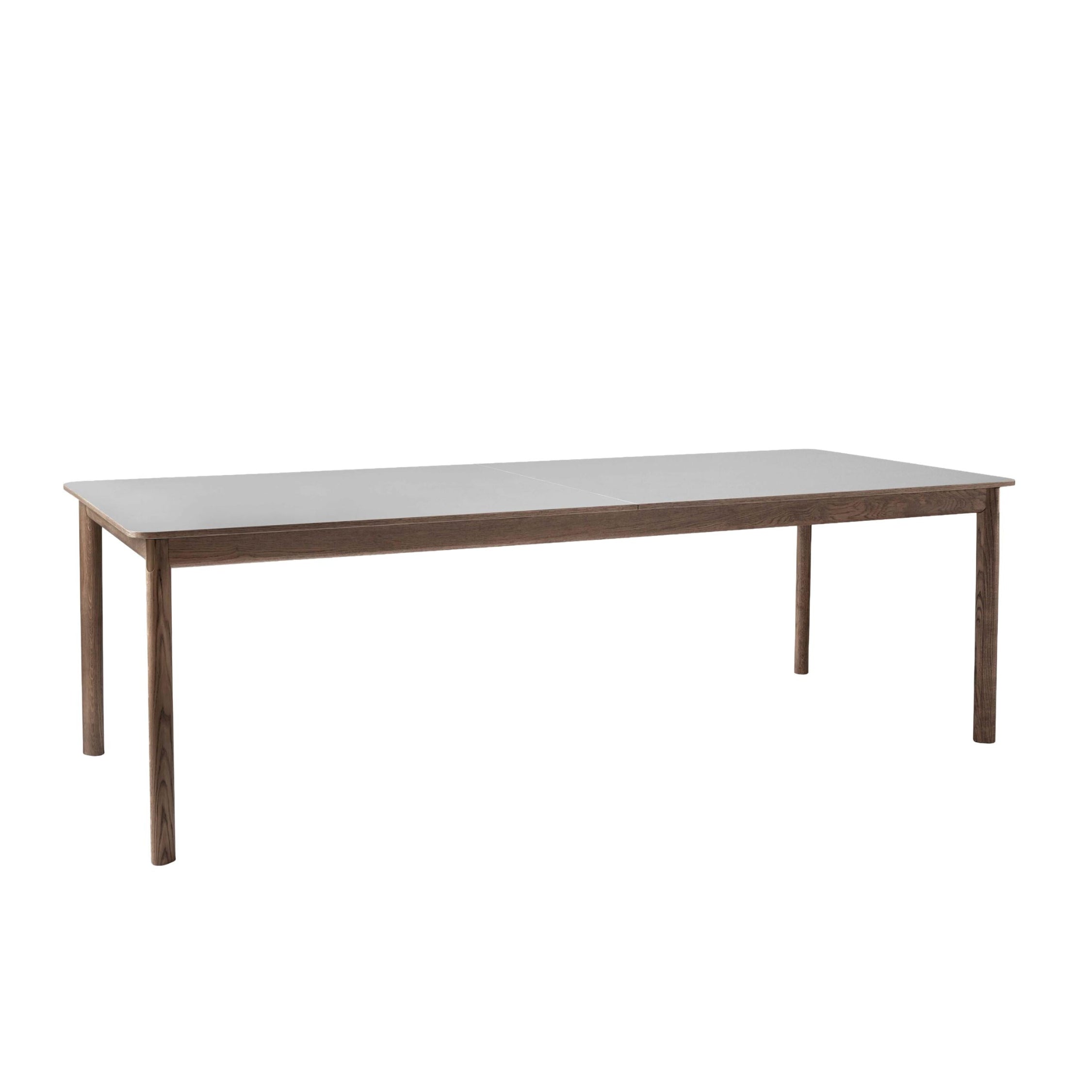 Uitschuifbare PATCH tafel met grijs gelamineerd blad en een basis van gerookt eikenhout