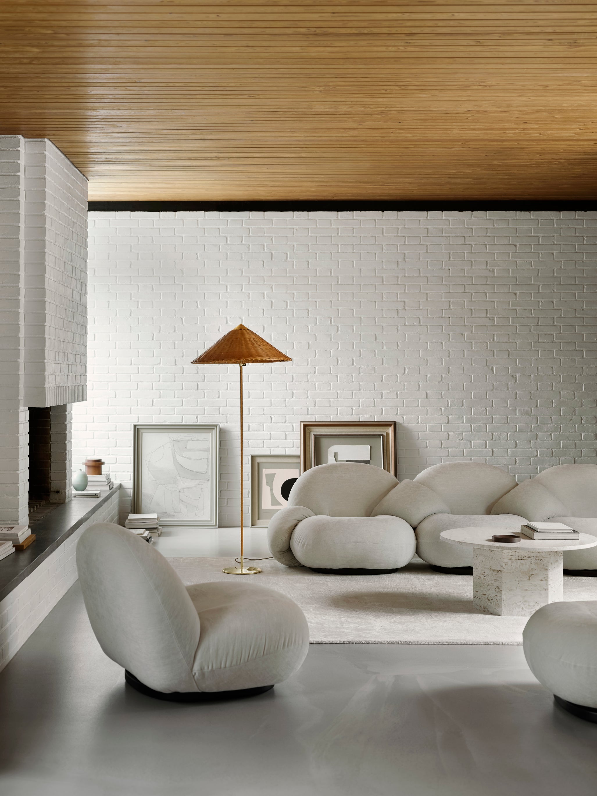 2-seater PACHA sofa upholstered with a gold base