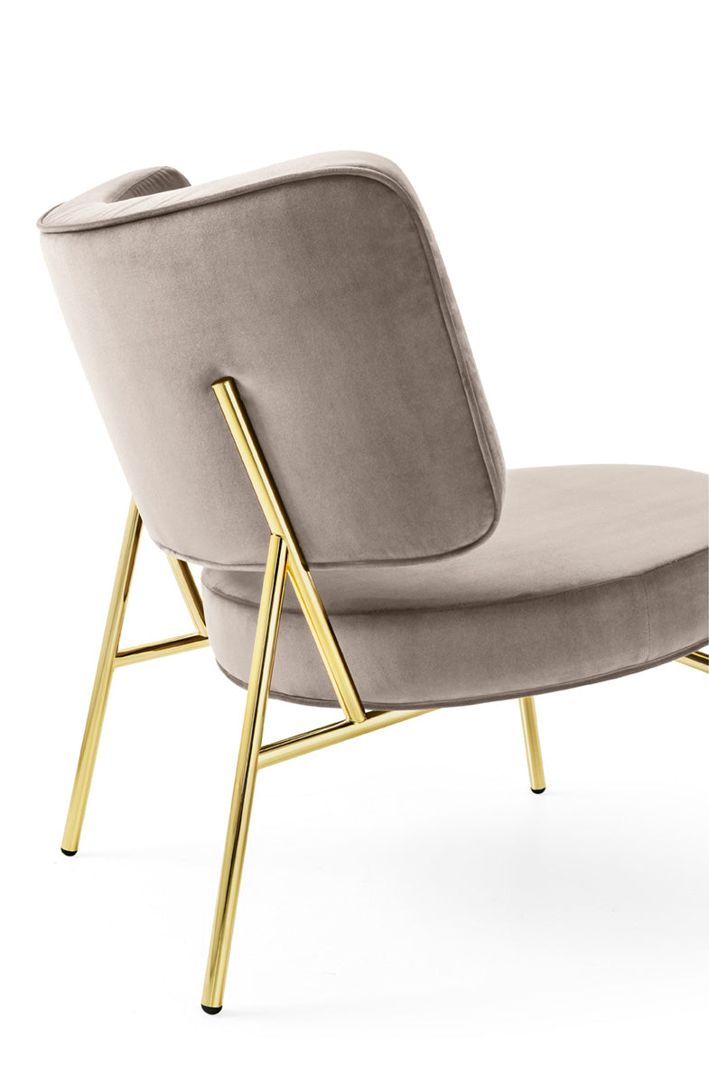 Upholstered COCO armchair with a golden base
