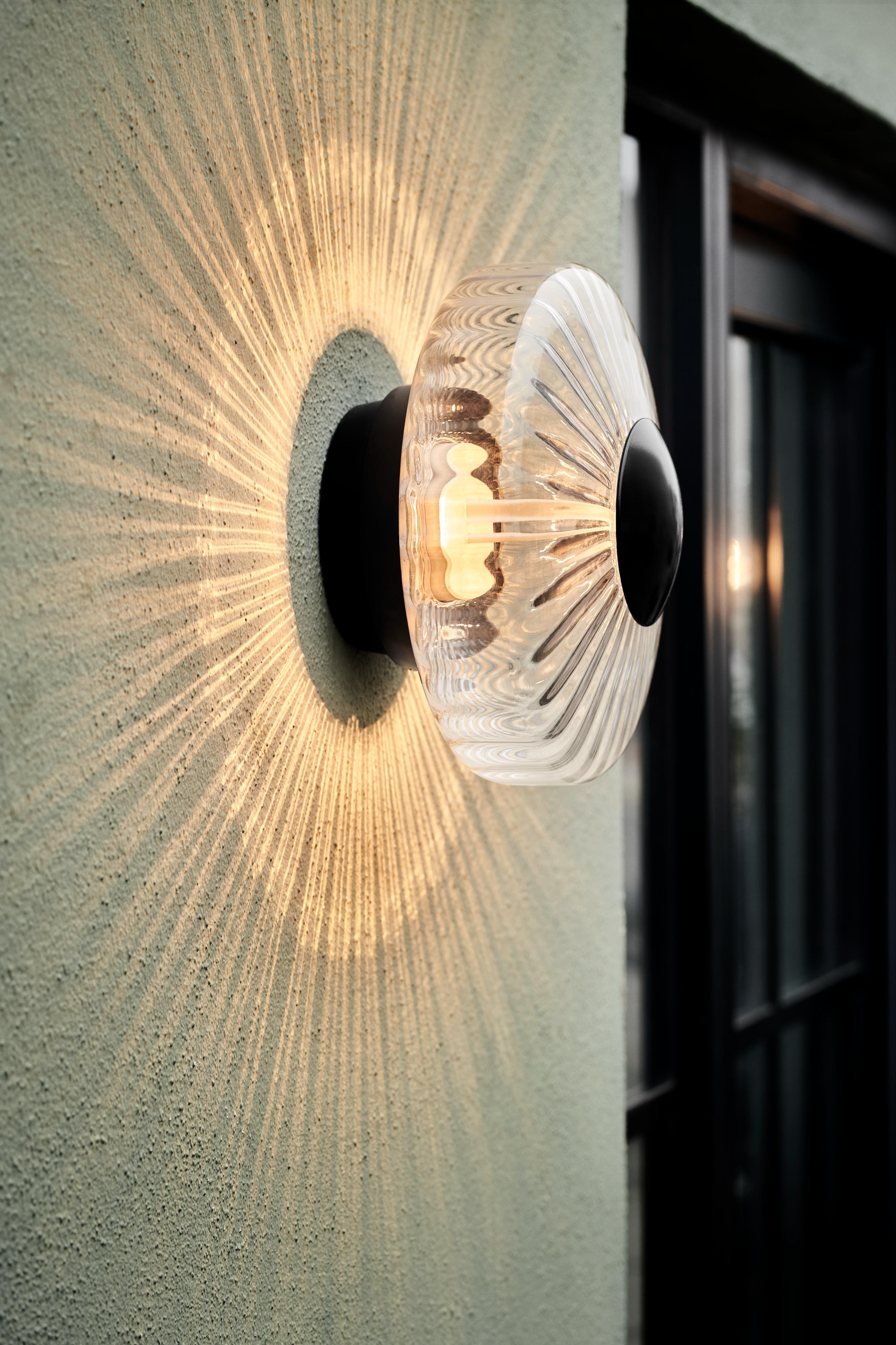 NEW WAVE OPTIC transparent outdoor wall lamp with black finish