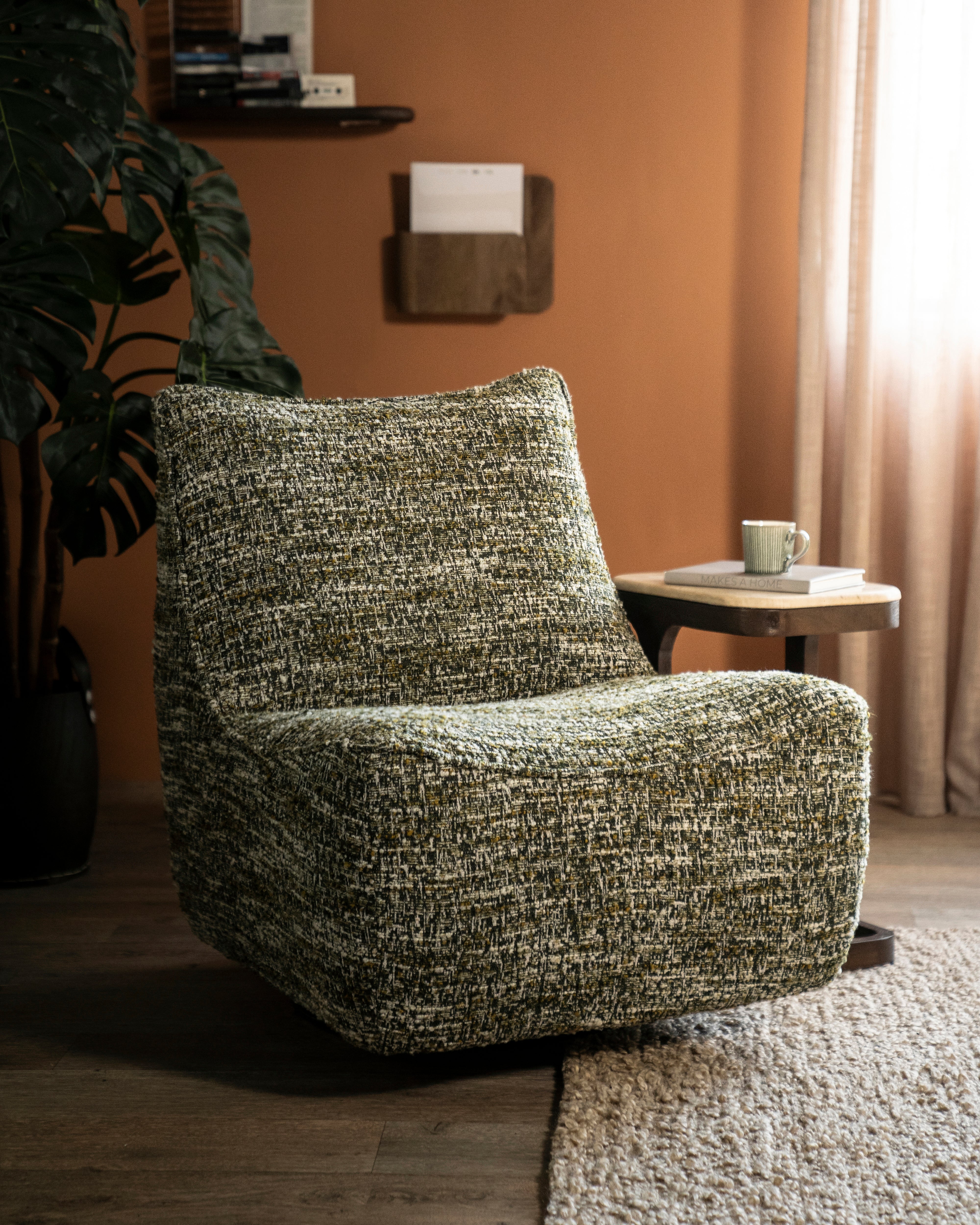 LOYS brown swivel armchair