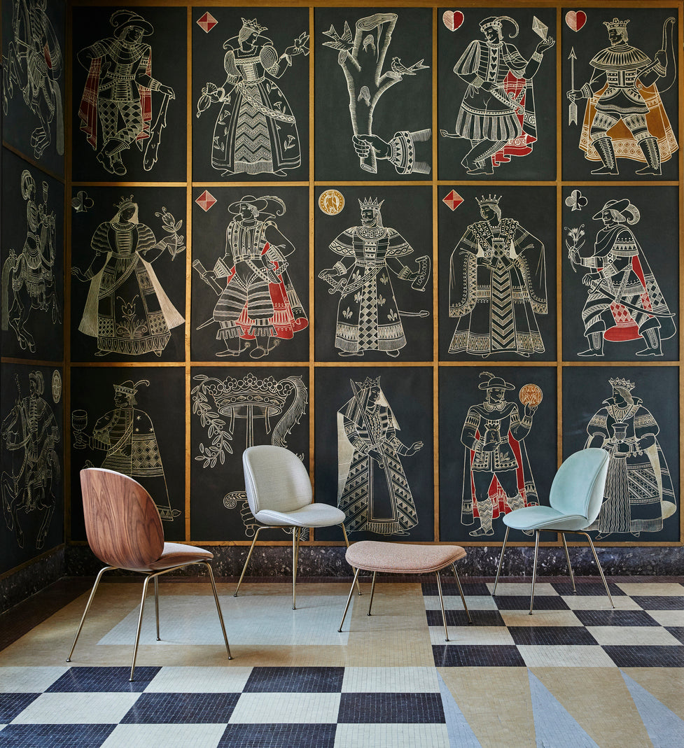 BEETLE pouf upholstered with a brass base