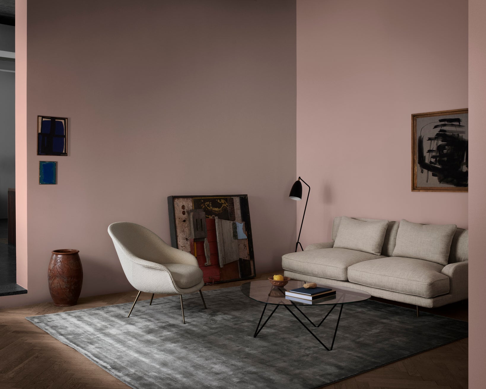 Upholstered BAT armchair with black base