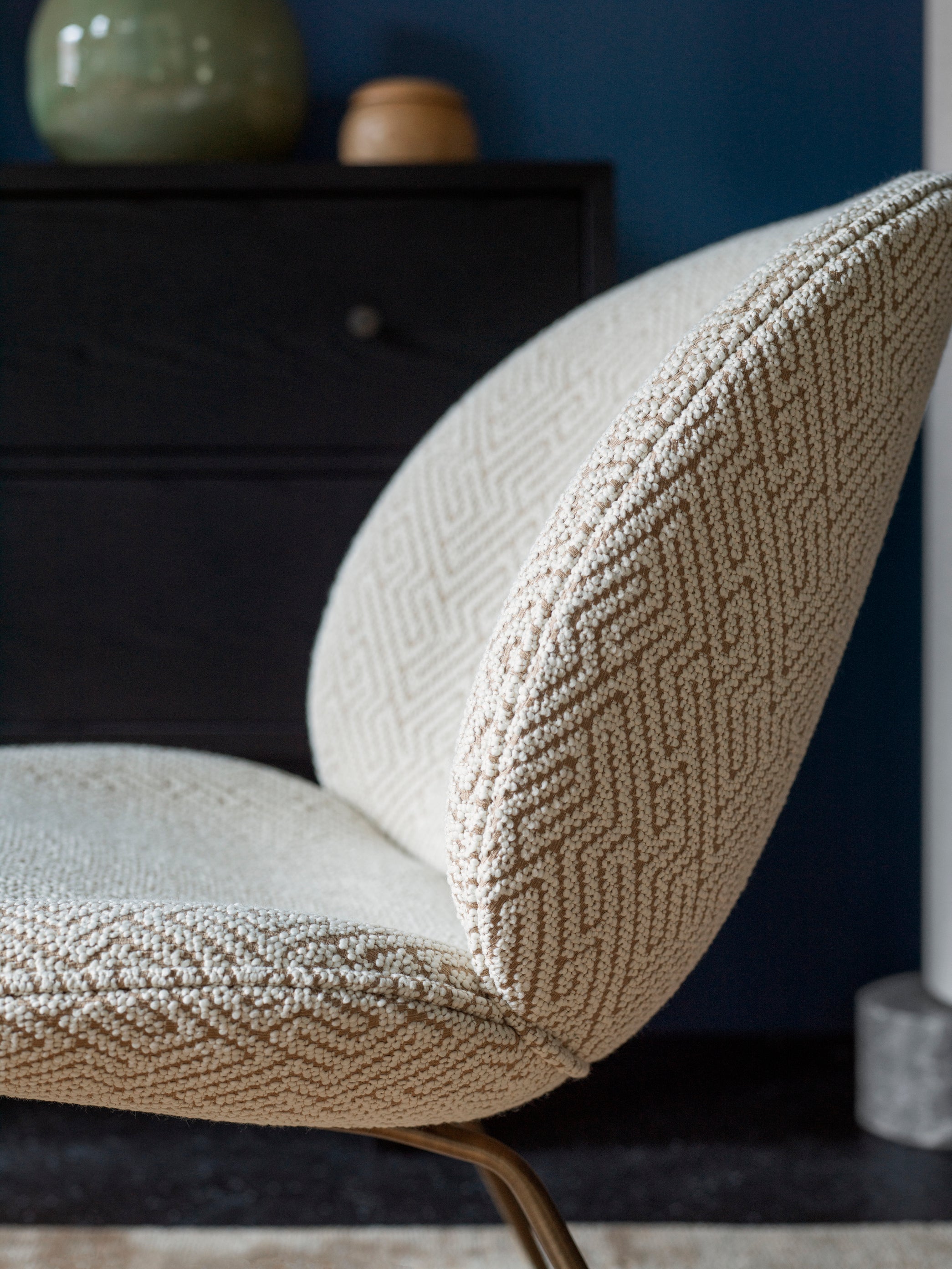 BEETLE upholstered armchair with brass base