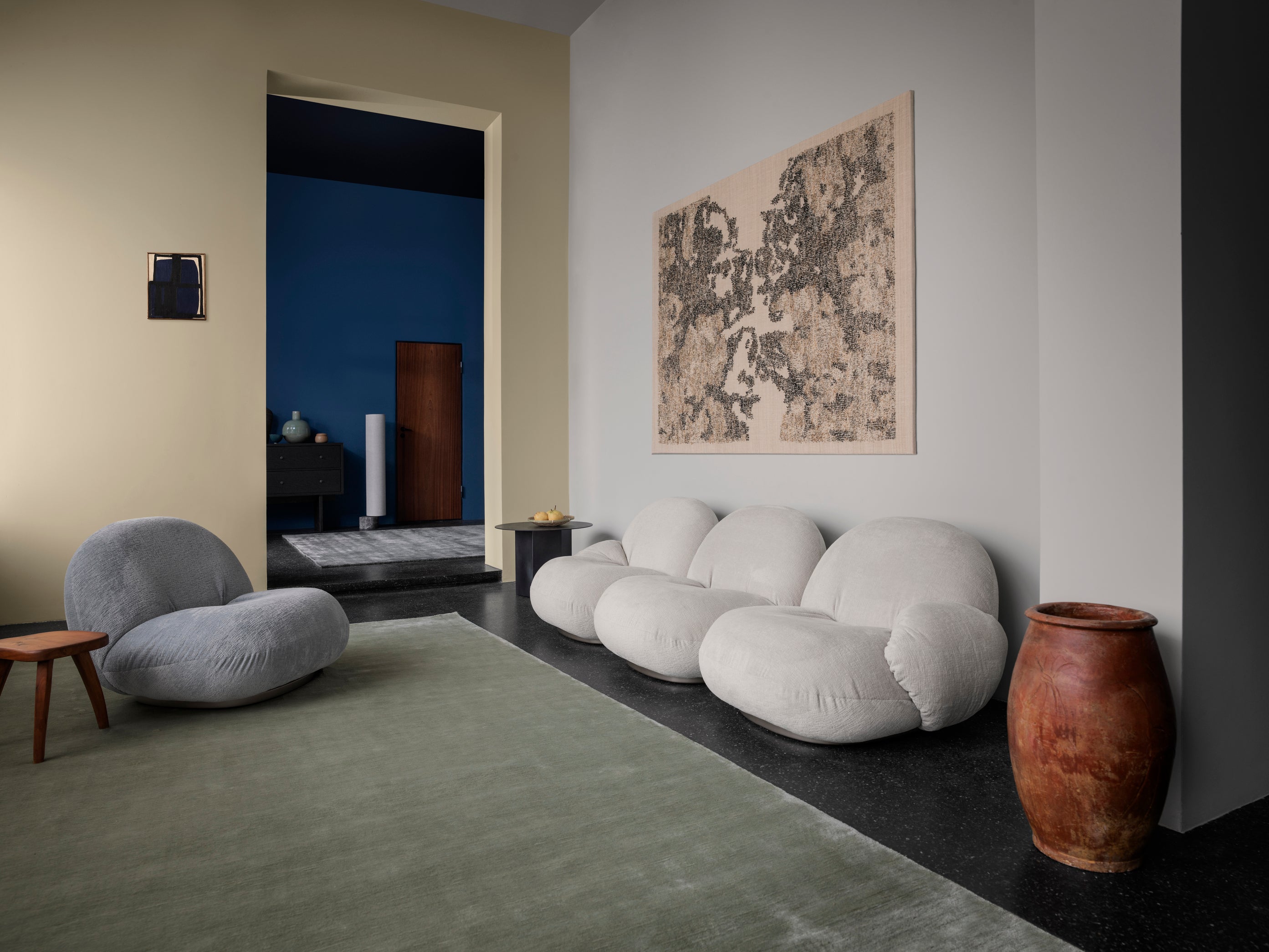 2-seater PACHA sofa upholstered with a gold base