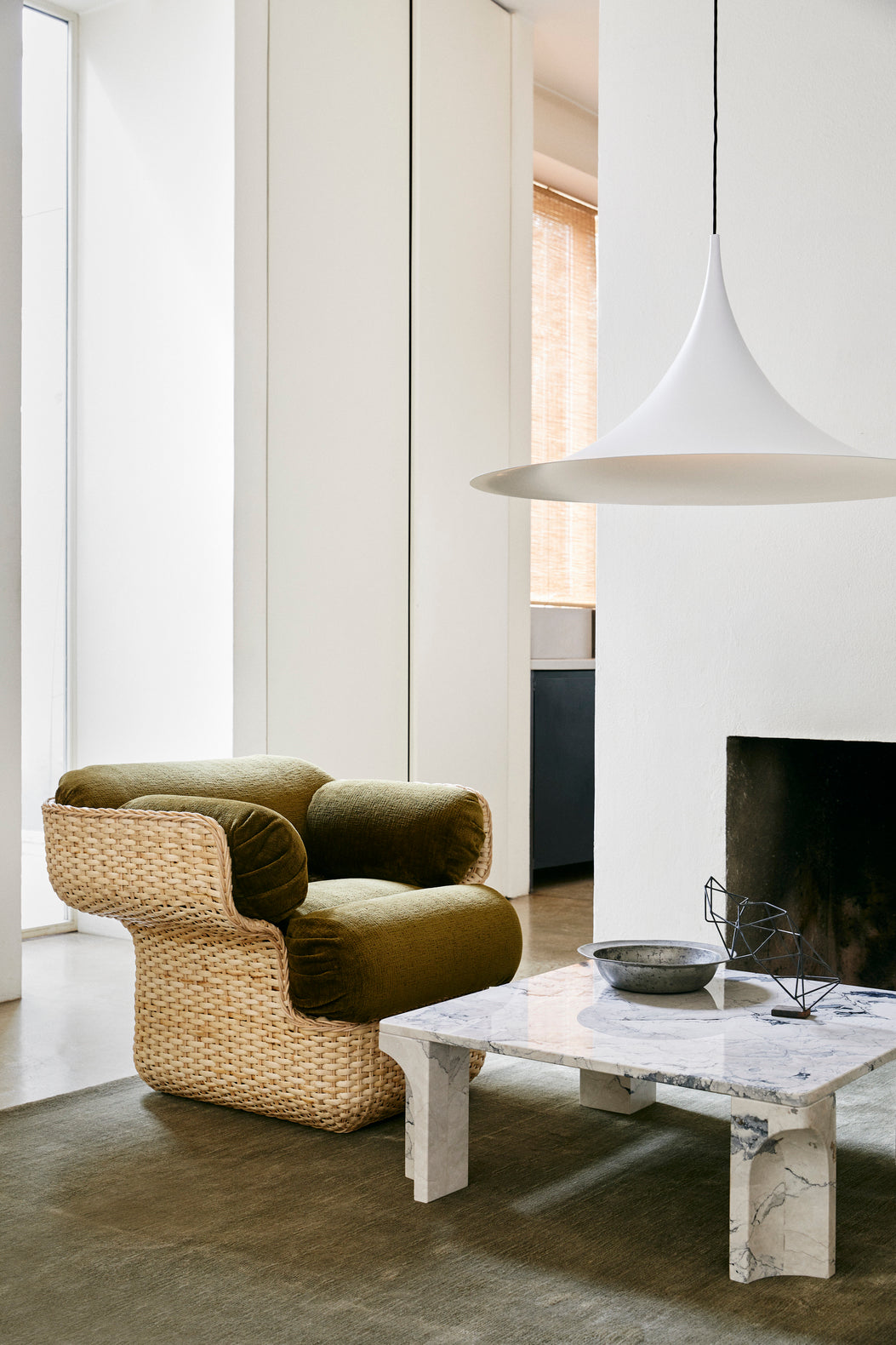 BASKET armchair in green with rattan