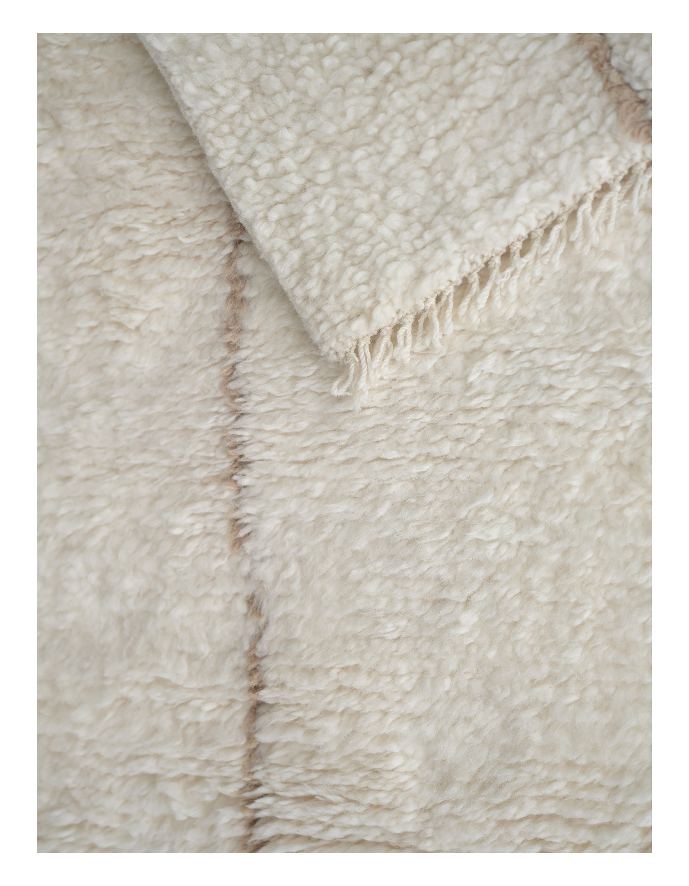 Teppich ASTRAL SPIRAL gebrochenes Weiß mit Karamellmuster