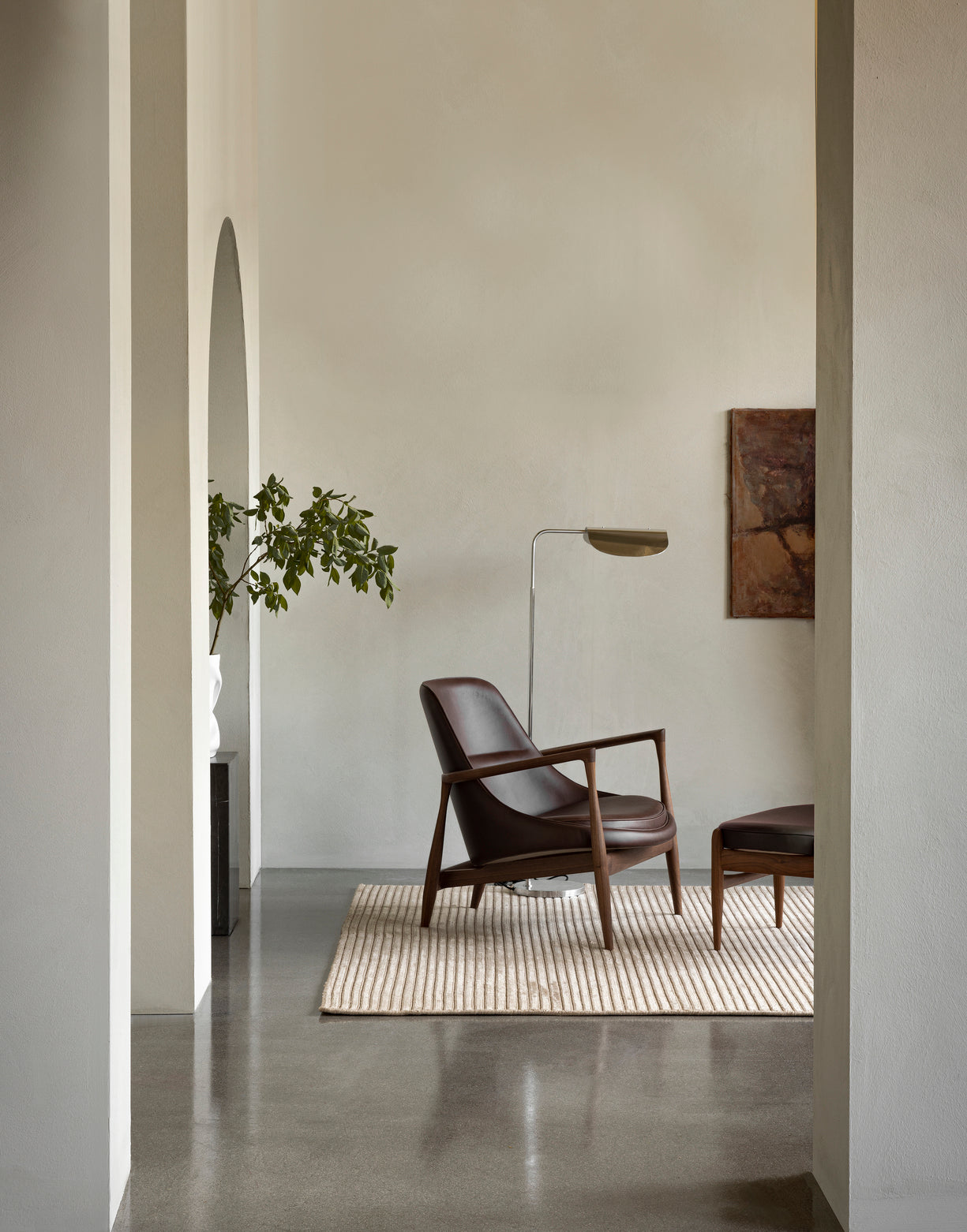 Stehlampe WING aus poliertem Aluminium