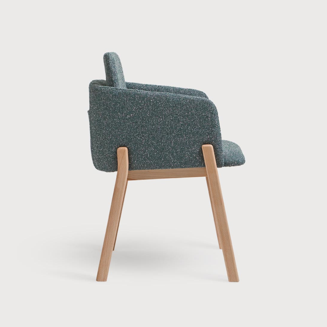 A chair with armrests Note B-4060 Upholstered