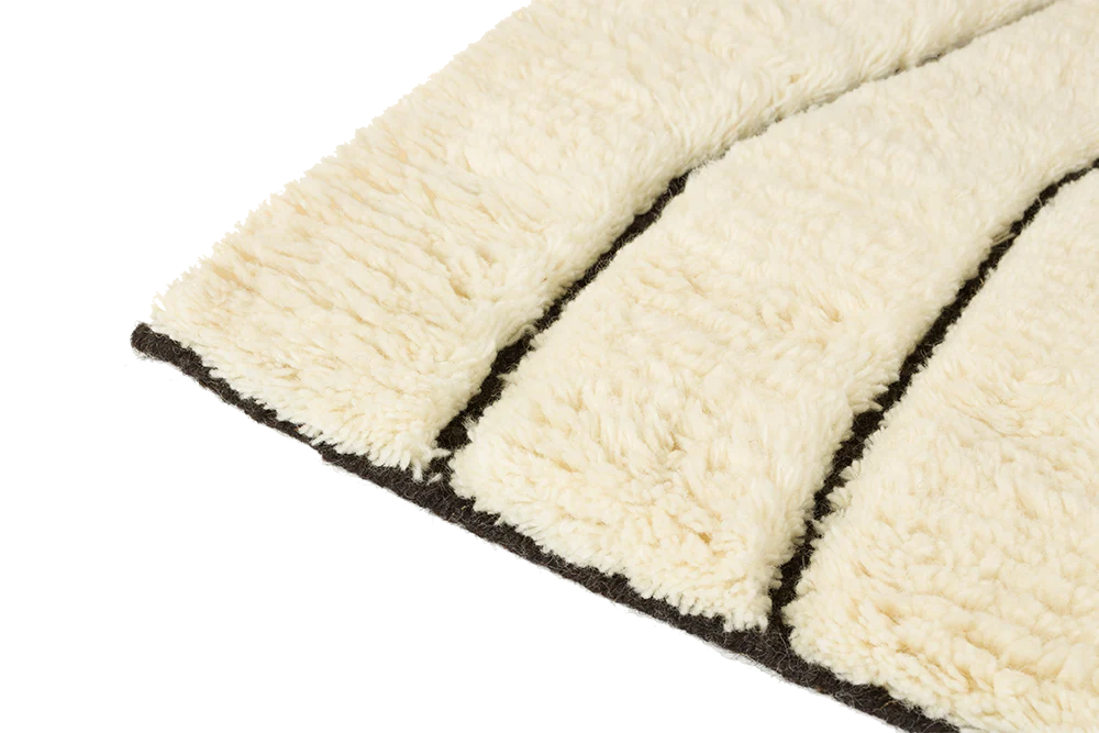 Vloerkleed SIGN crème met zwart patroon