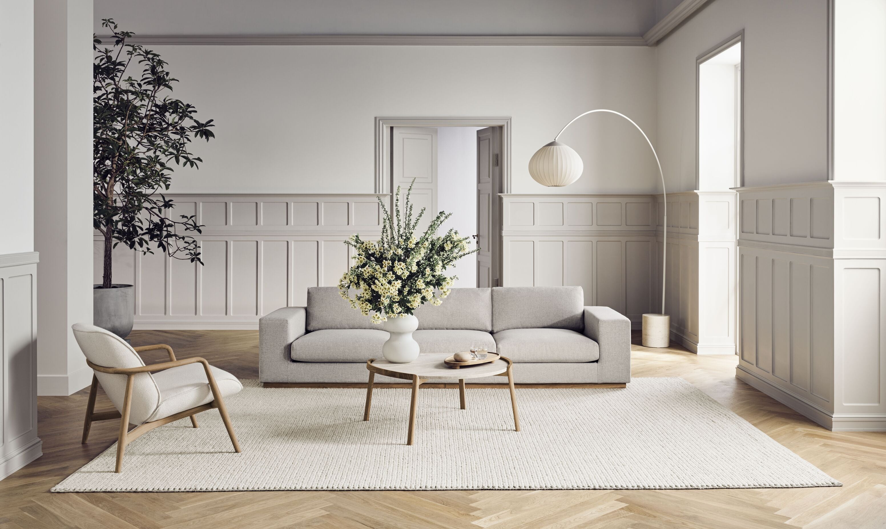 Symmetrische hoekbank SEPIA met eikenhouten basis