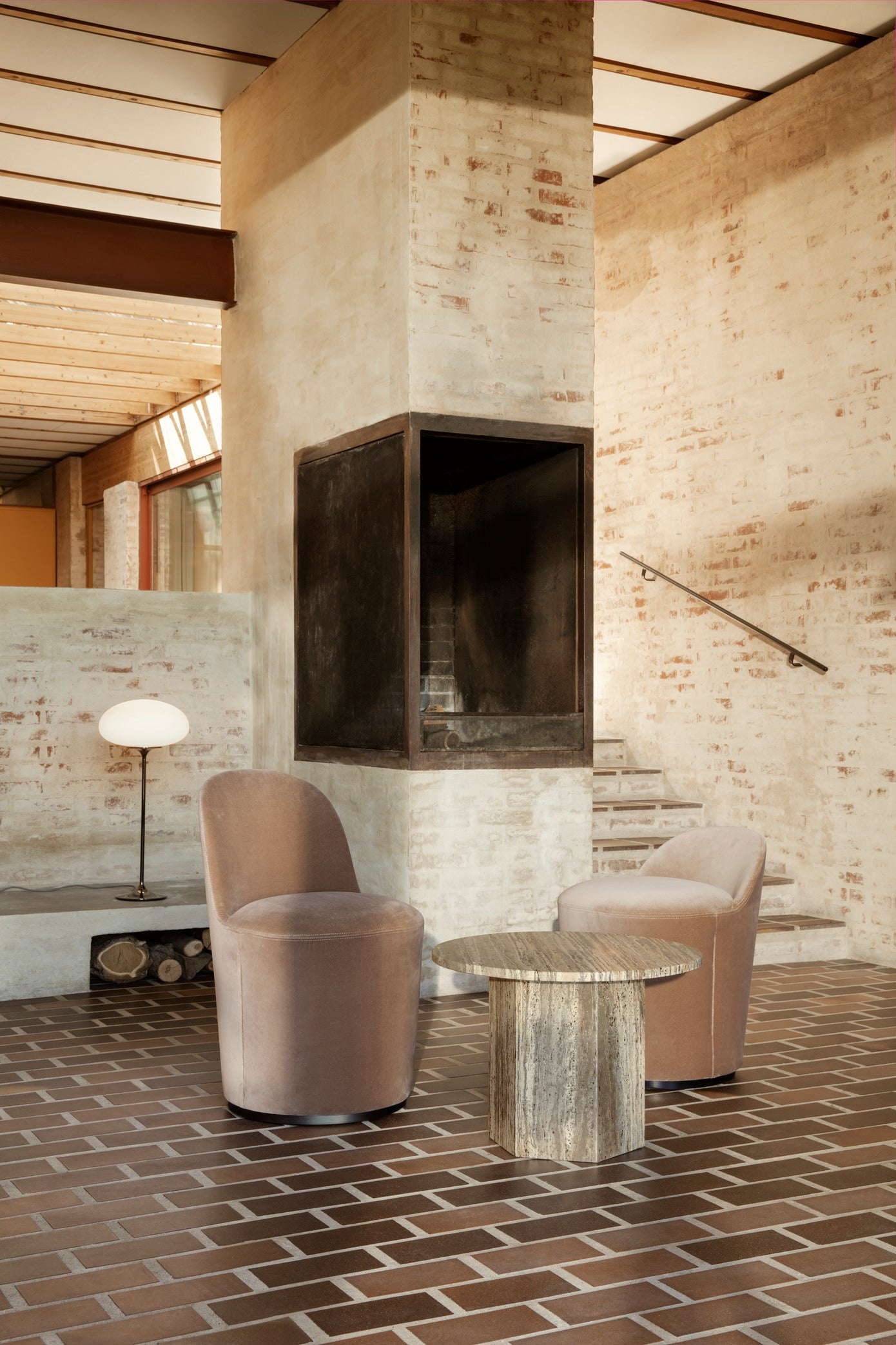 Upholstered TAIL armchair with a black base