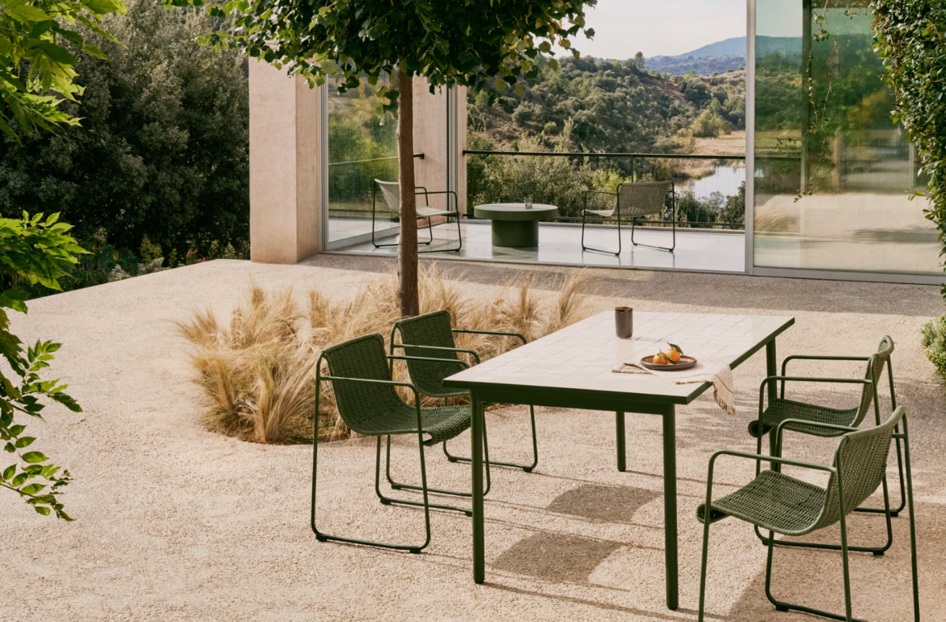 Buitenstoel MAURINA grijs met groene stalen basis