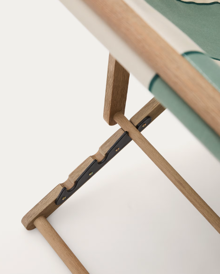 A green-beige Vilara deckchair with an acacia base