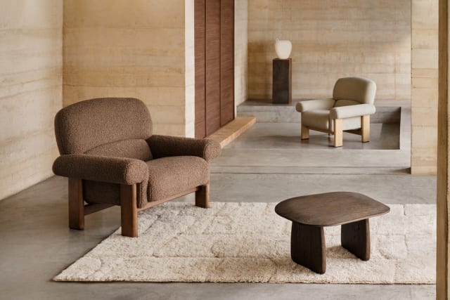 NEMA armchair in brown boucle with a dark ash base