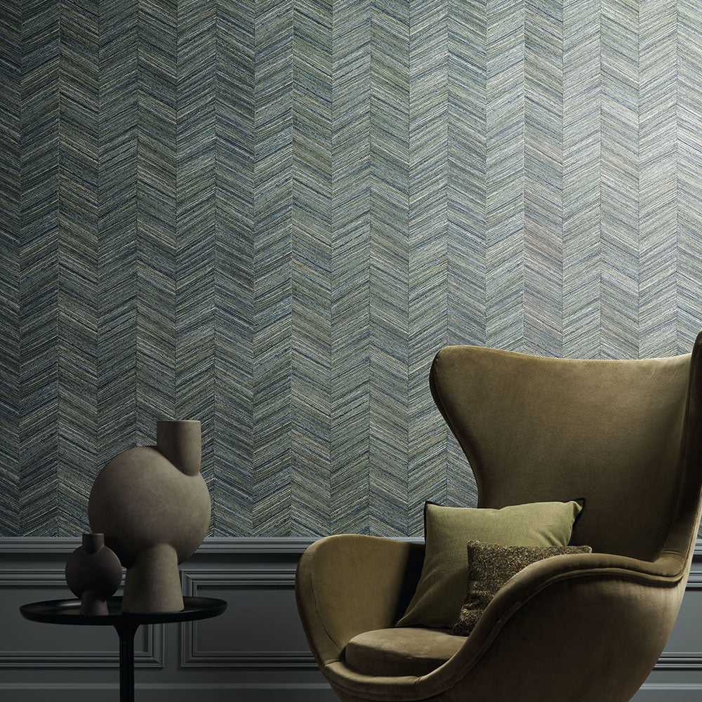 Geometric structural wallpaper imitating wood with a herringbone pattern OCOTEA - VERT IMPERIAL muted green