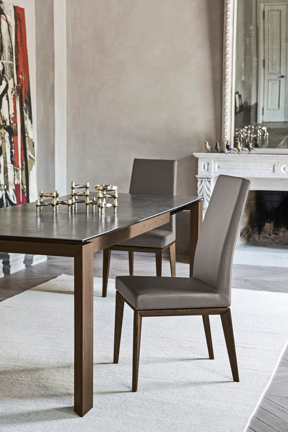 BESS upholstered chair with a dark wooden base