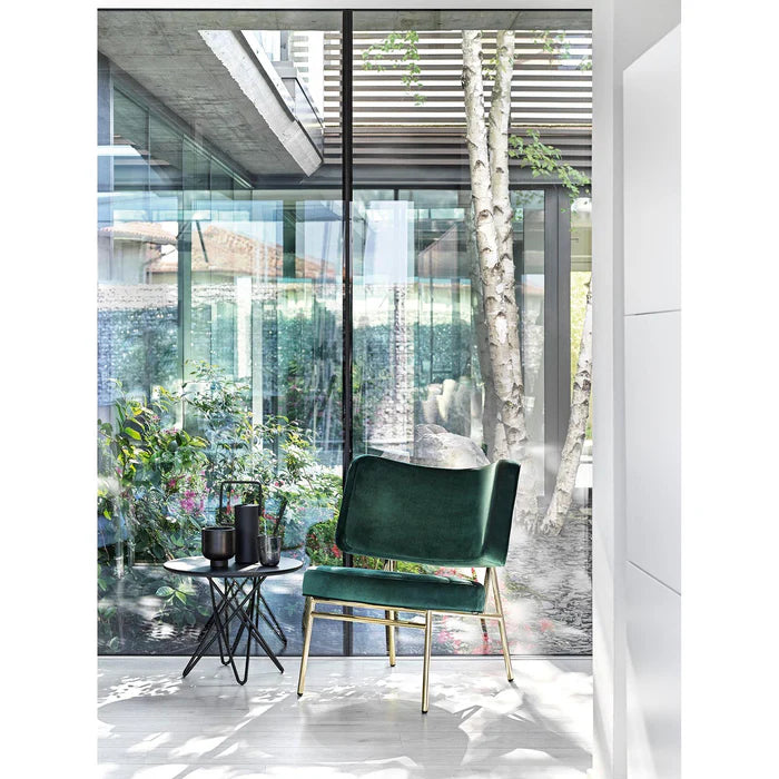 Upholstered COCO armchair with a golden base