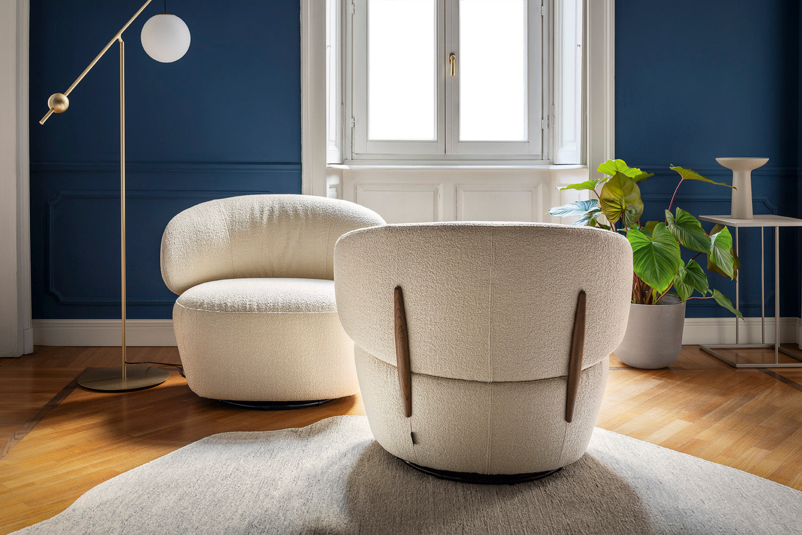 Upholstered swivel armchair MARA