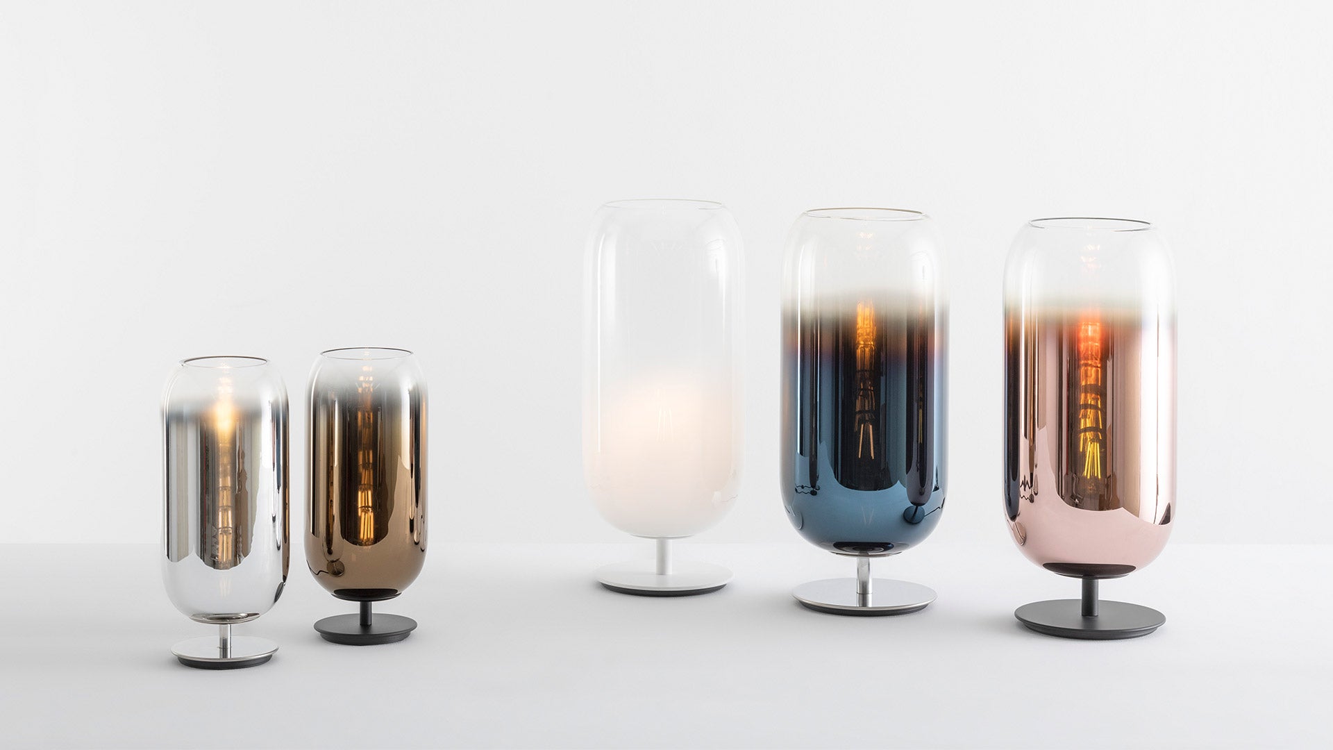 GOPLE table lamp in copper with a black base