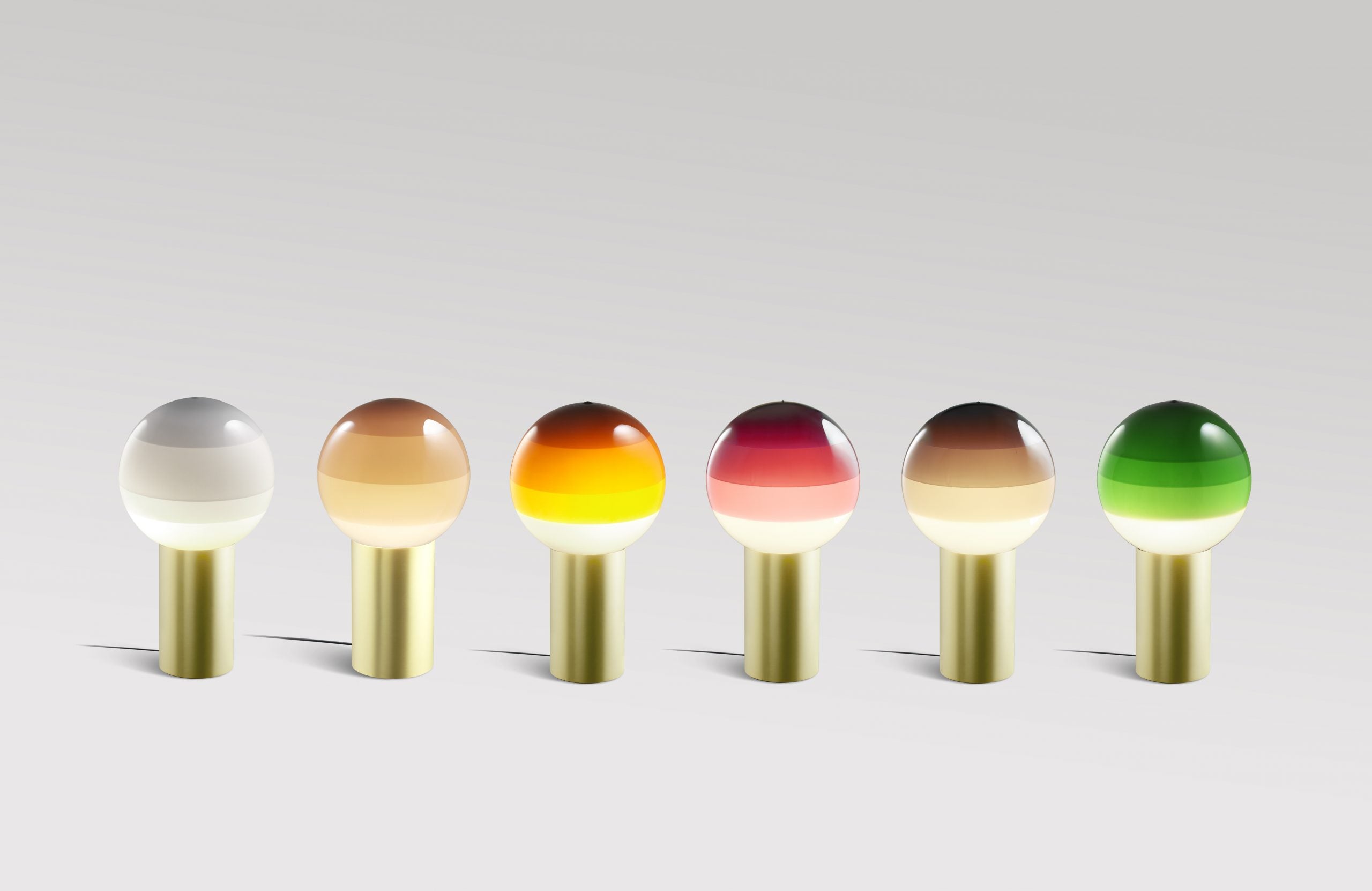 DIPPING green table lamp with a gold base