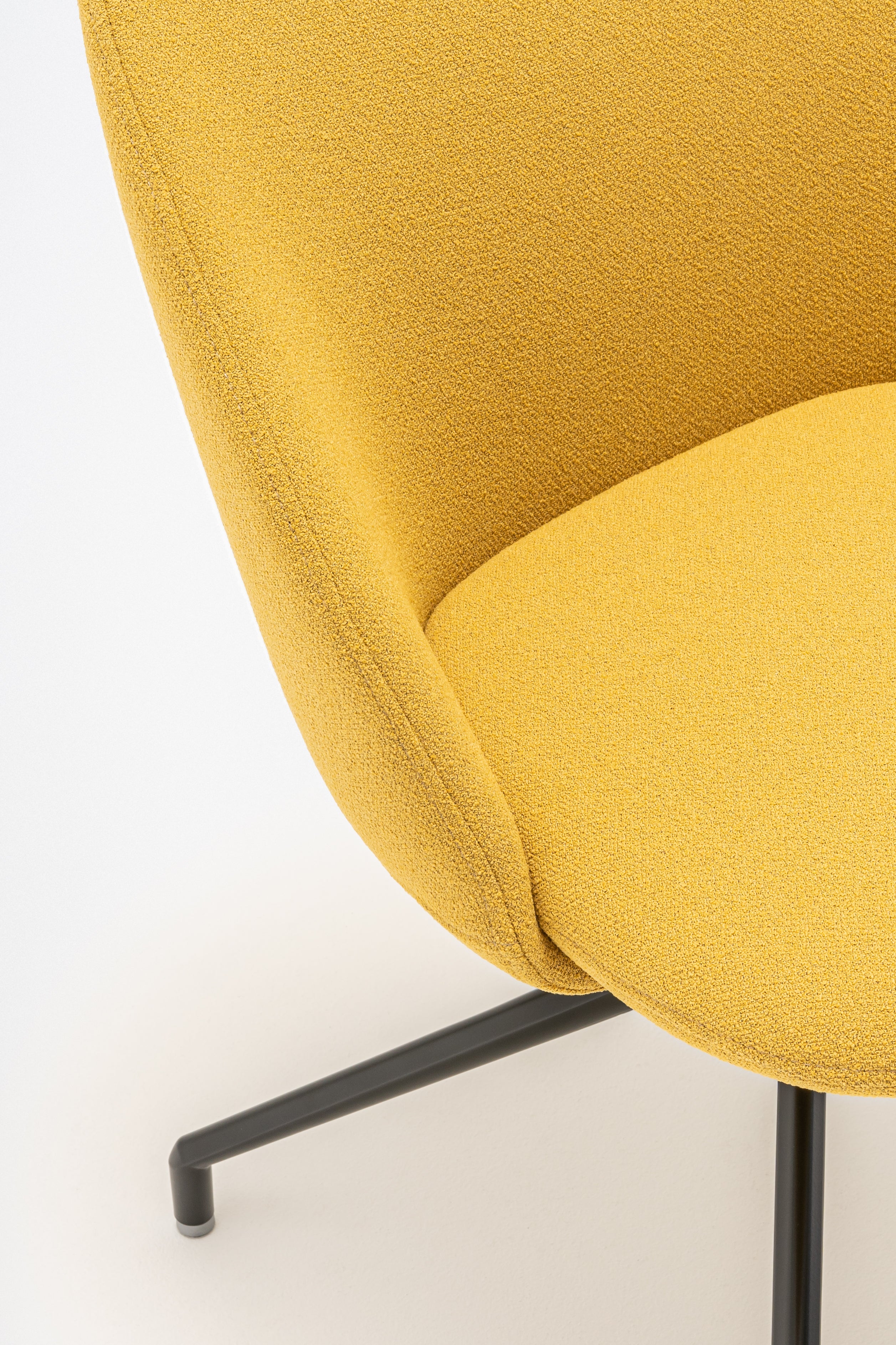 Rotable armchair with low backrest metal parallel base