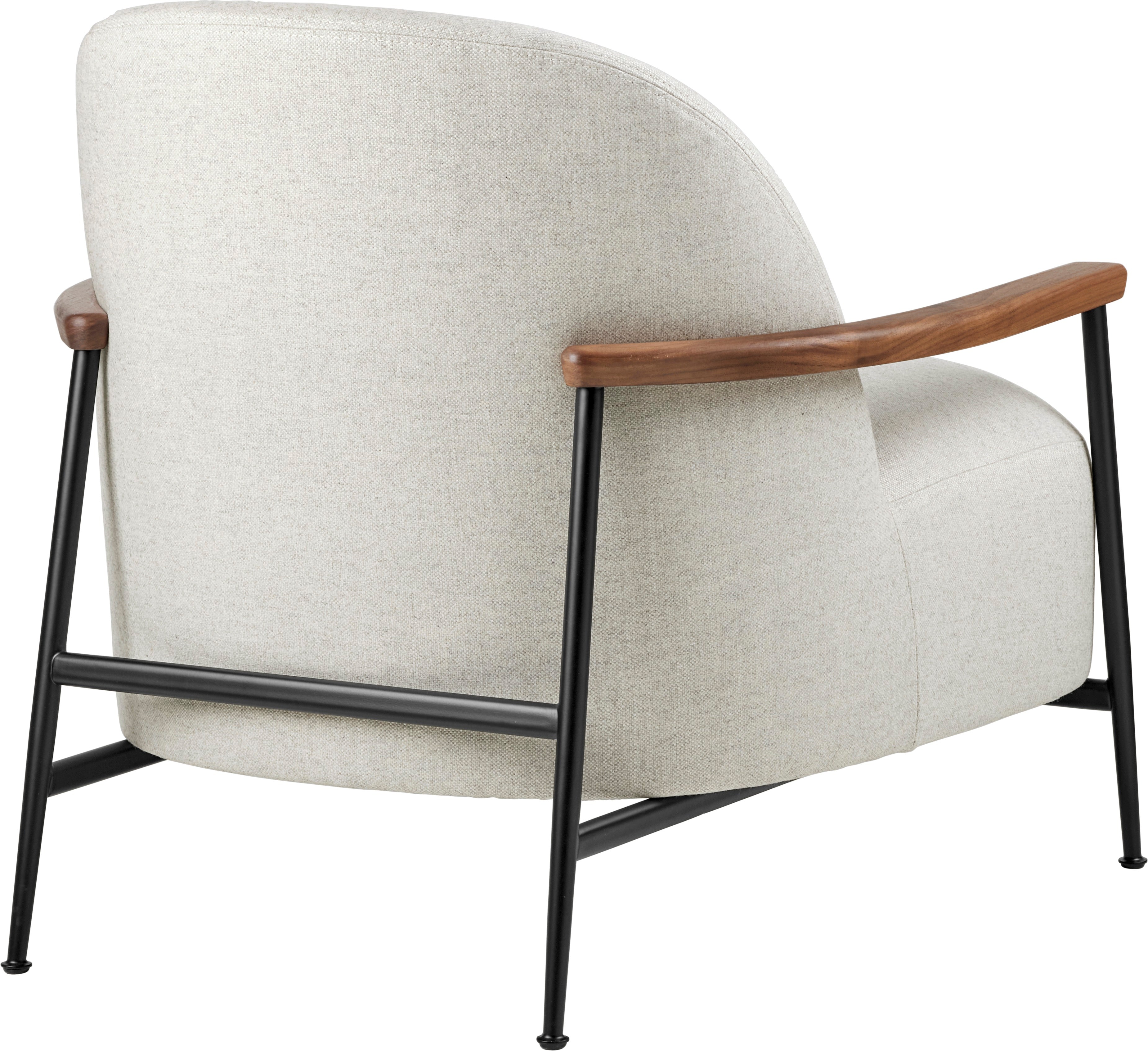 SEJOUR upholstered armchair with black base