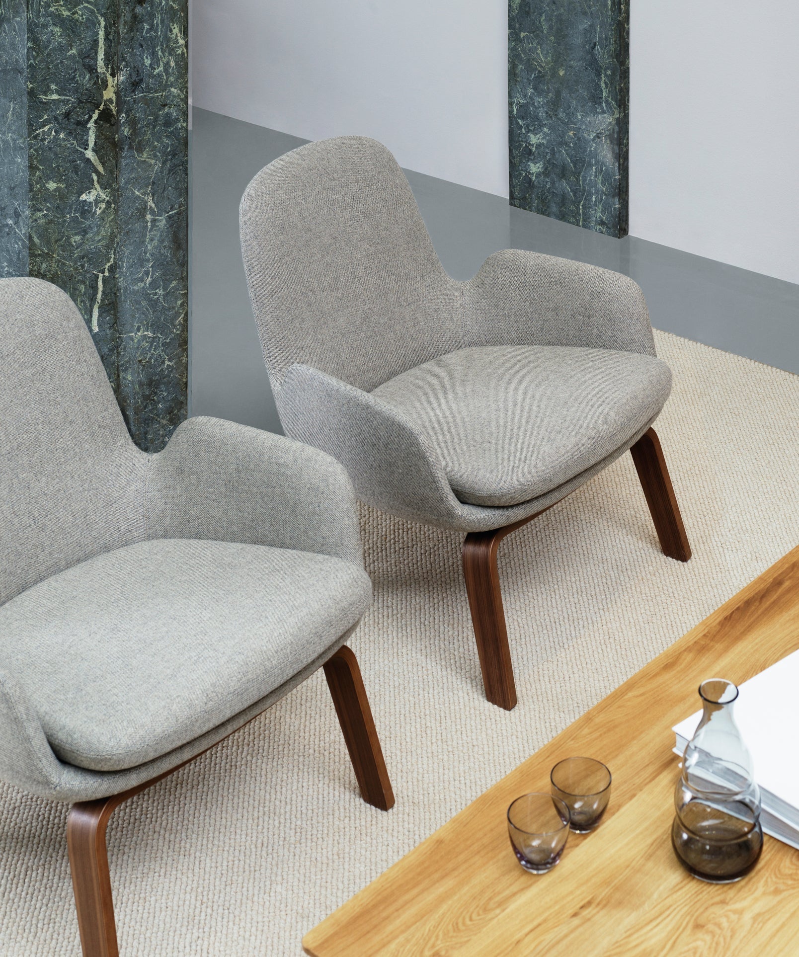 Upholstered armchair era low nutty base