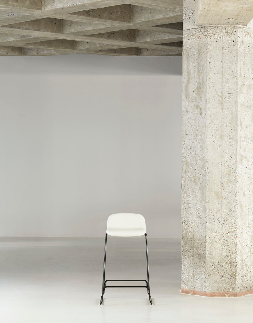 Upholstered bar chair with a backrest with a chrome base