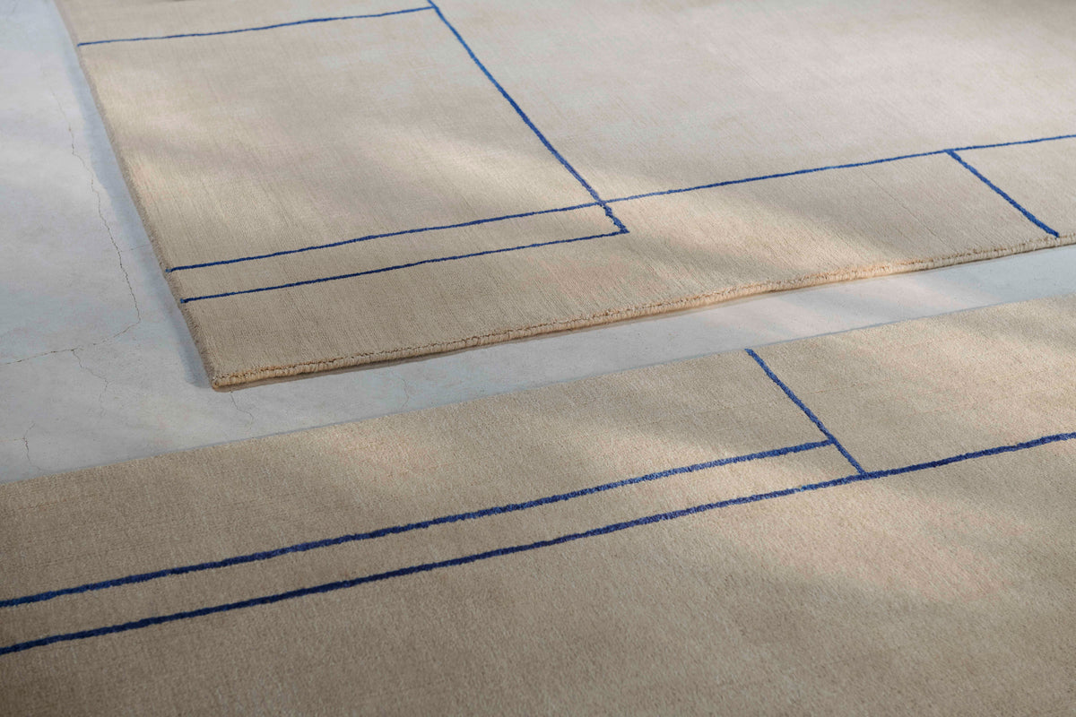 Vloerkleed CRUISE zandkleurig met blauw