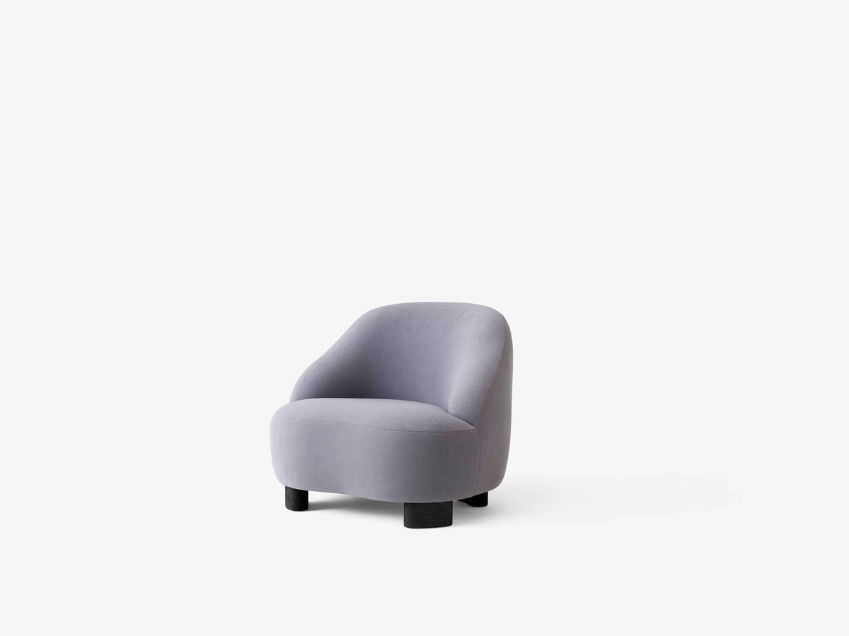 Gestoffeerde MARGAS LC1 fauteuil met notenhouten basis