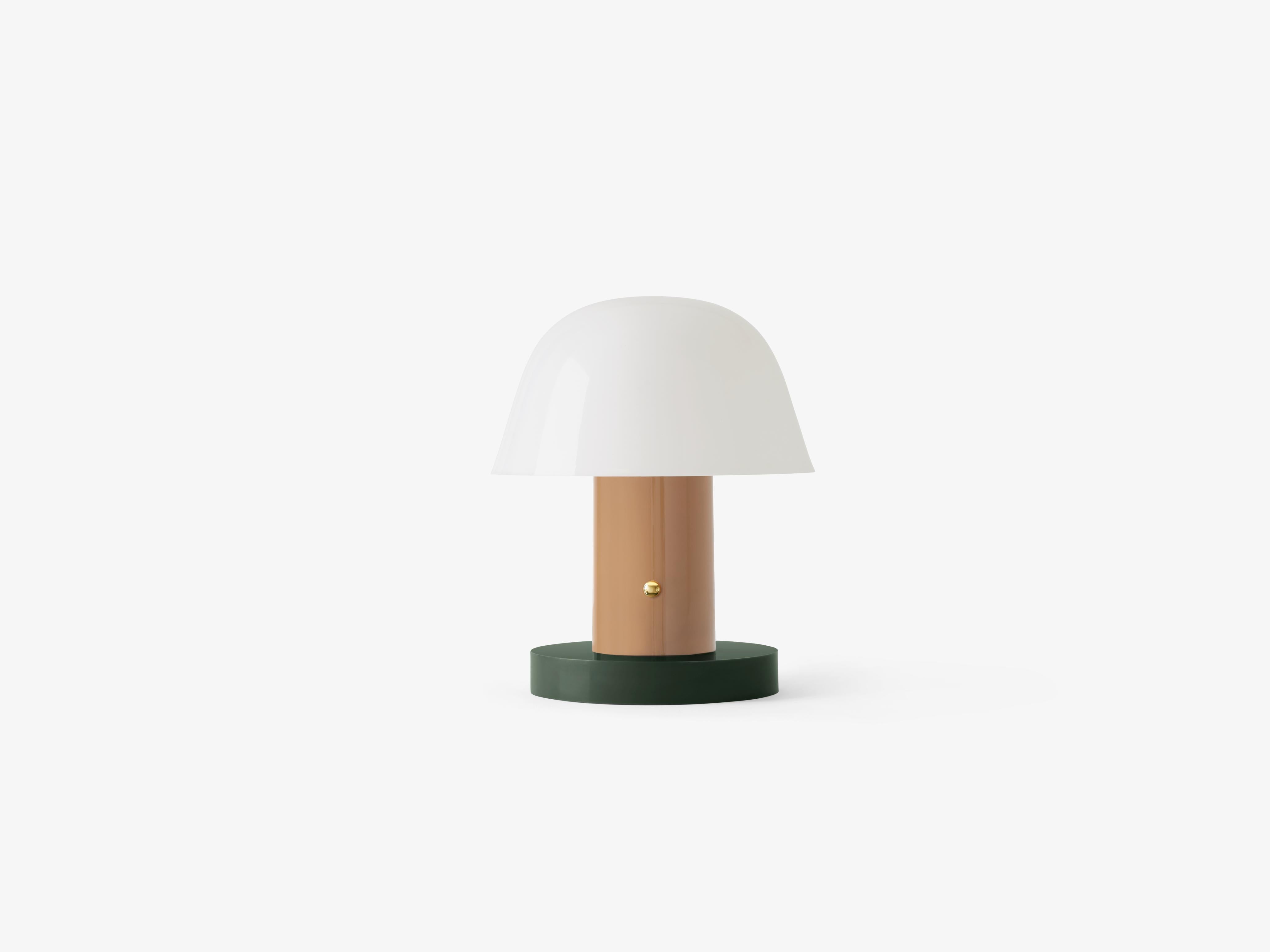 Draagbare lamp SETAGO JH27 met een crèmekleurige kap en een beige-groene voet.