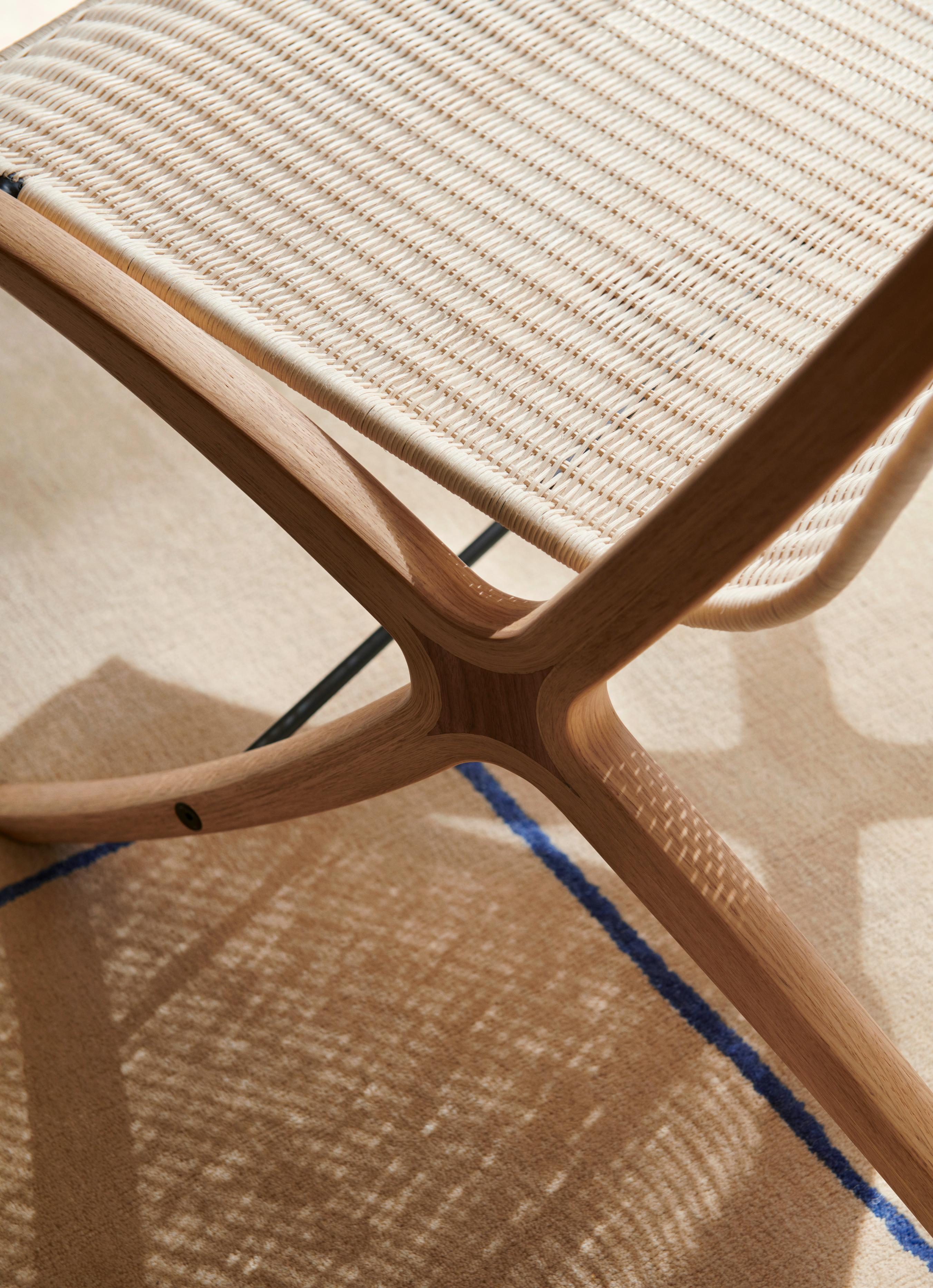 Fauteuil X HM10 met rieten zitting en houten basis