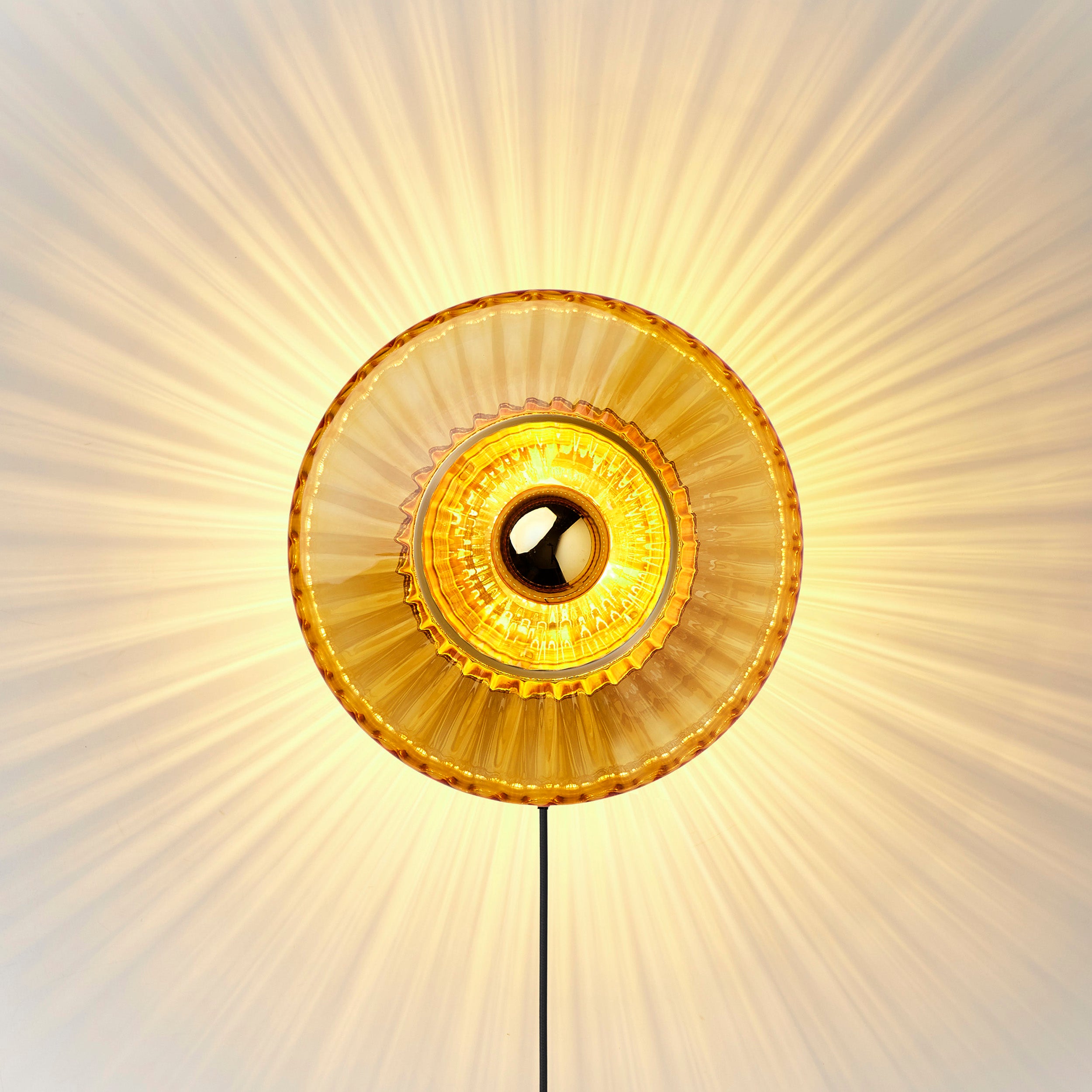 NEW WAVE OPTIC amber transparent wall lamp
