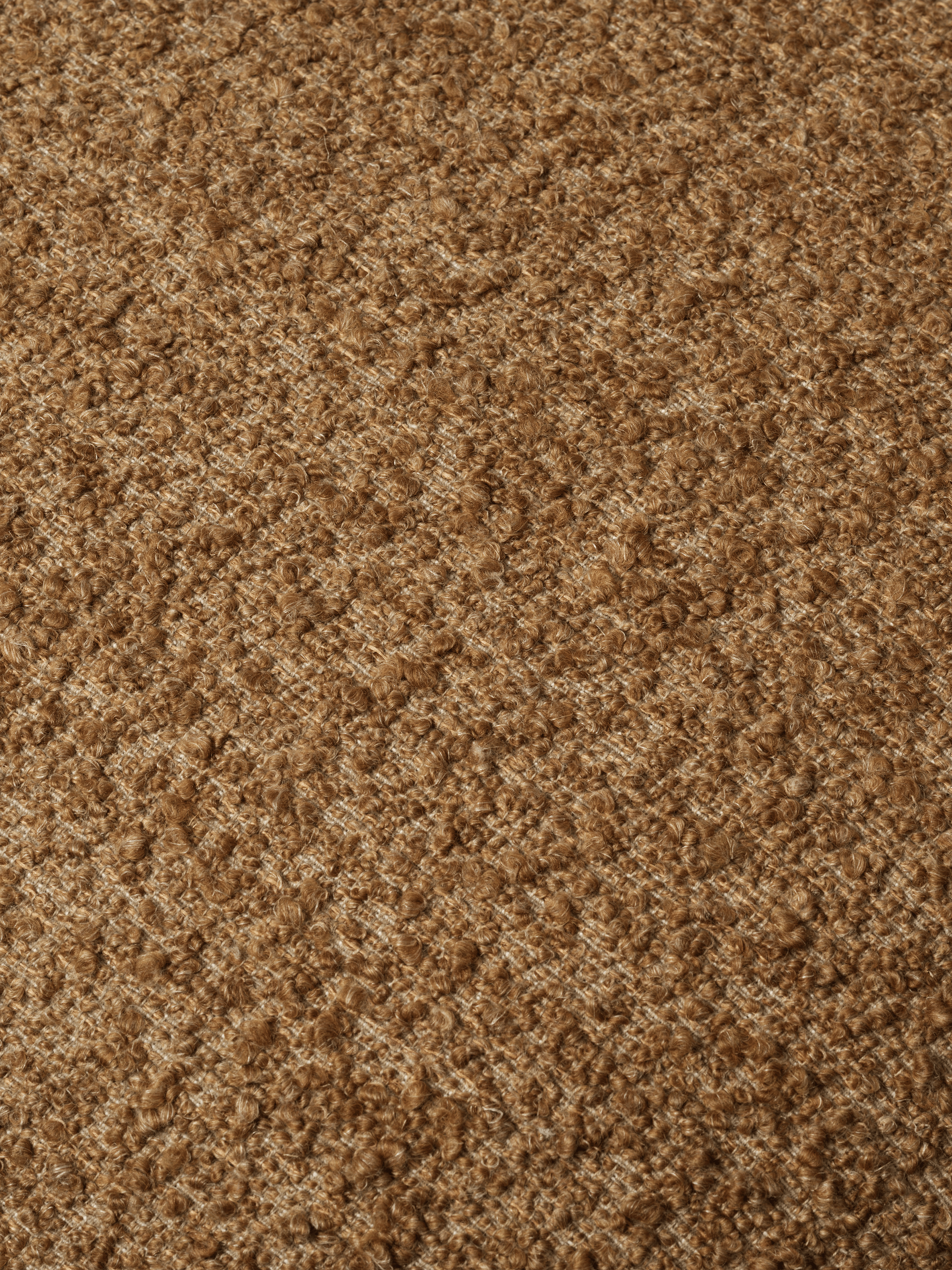 Fauteuil ORBO koffie boucle