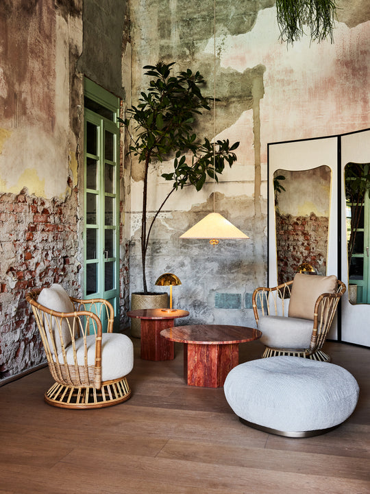 GRACE upholstered armchair with a rattan base