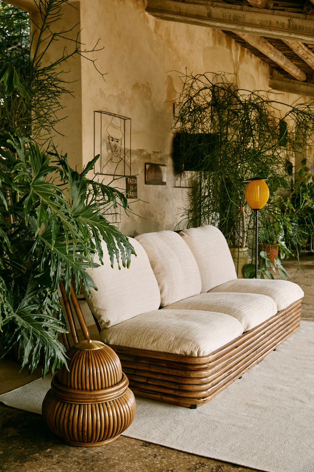 BOHEMIAN Sofa 72 upholstered with a rattan base