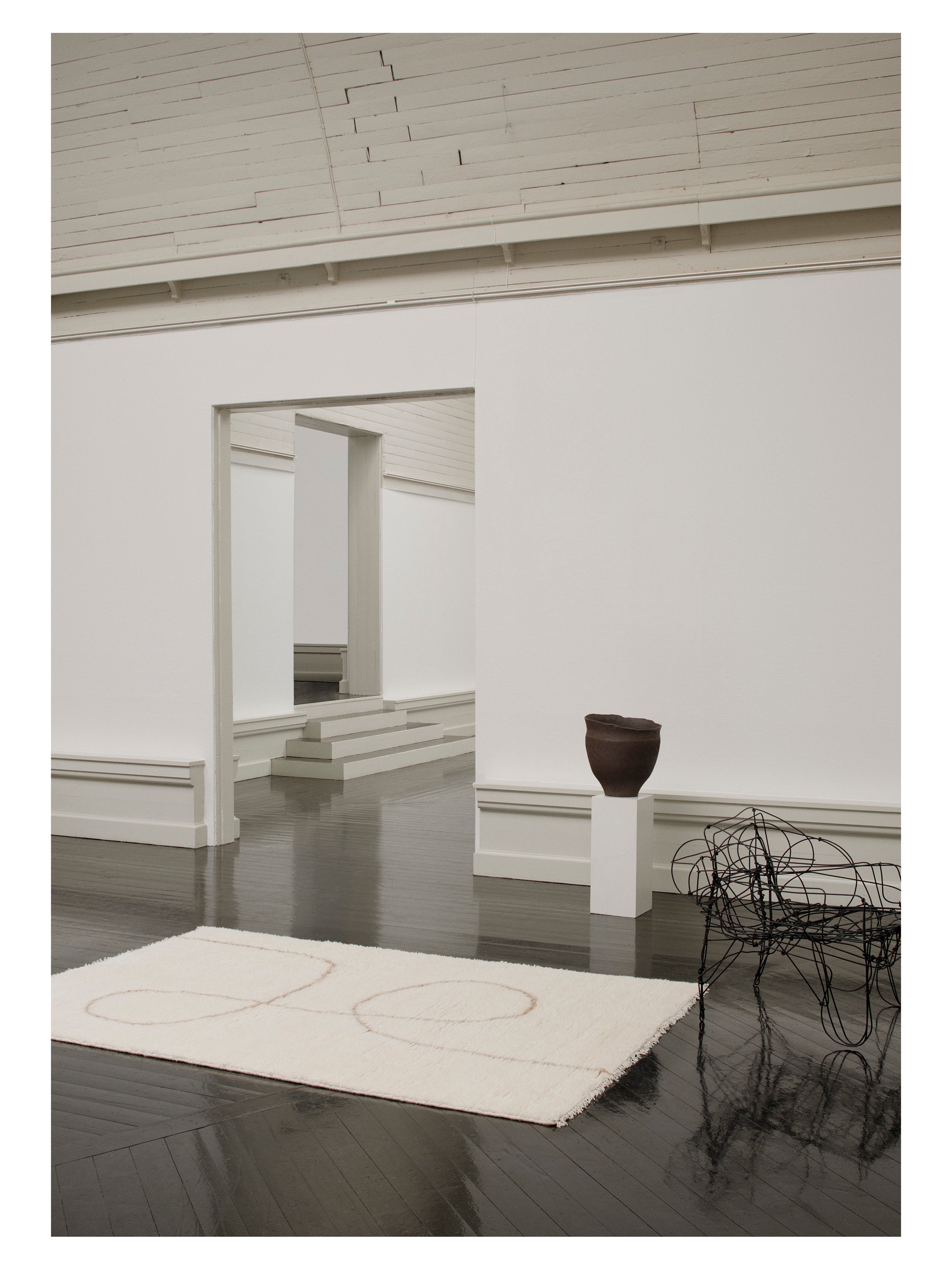 Teppich ASTRAL SPIRAL gebrochenes Weiß mit Karamellmuster