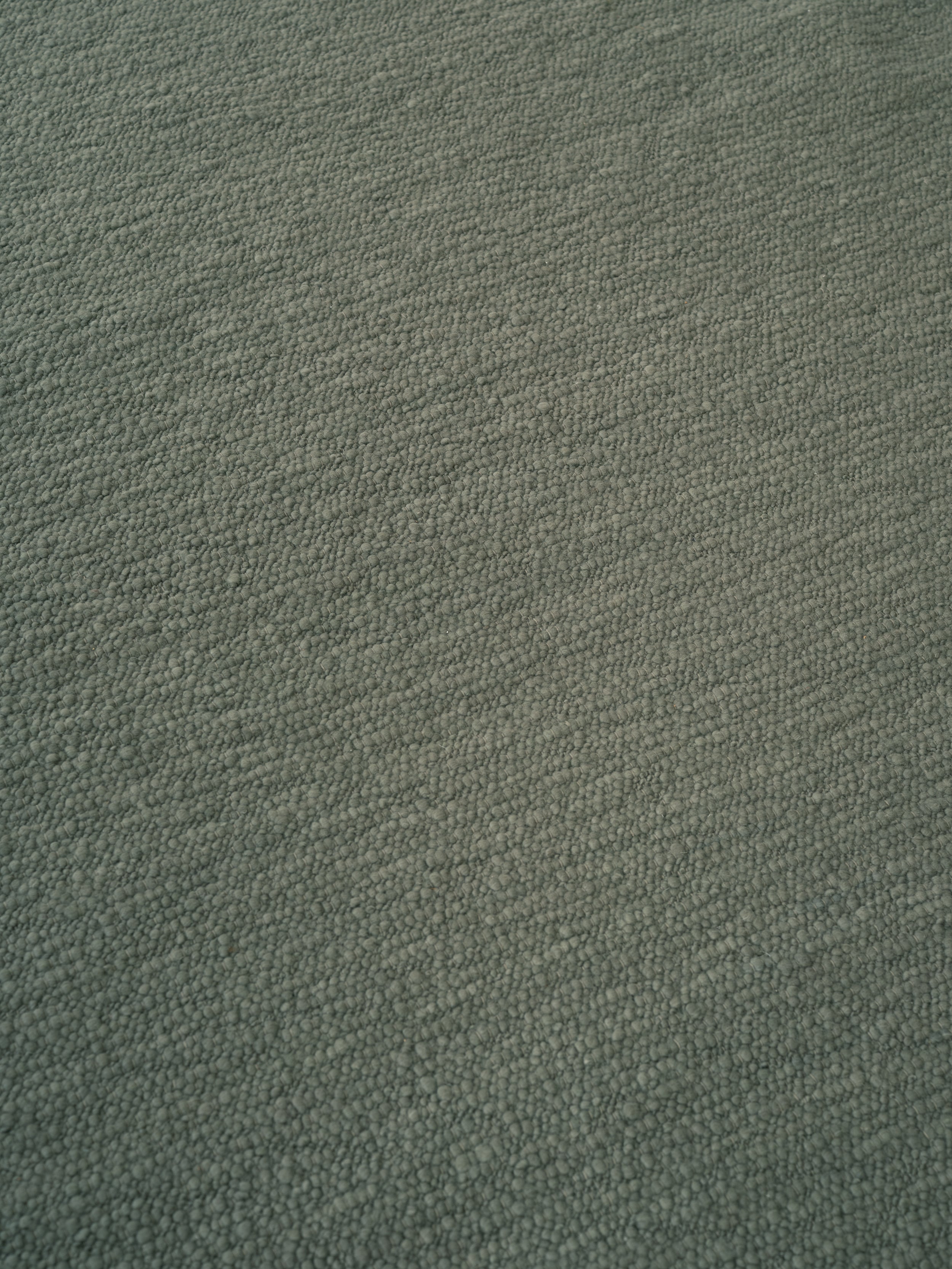 Teppich PEBBLED POEM grün Moos